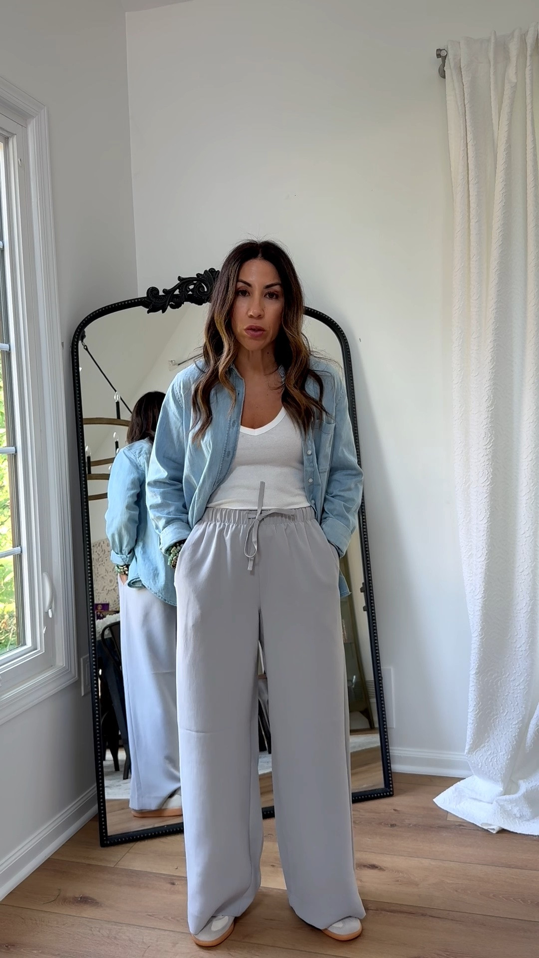 Pants small short. Small denim button-down shirt. Tank small. Sneaker size down ￼

#LTKOver40 #LTKPetite