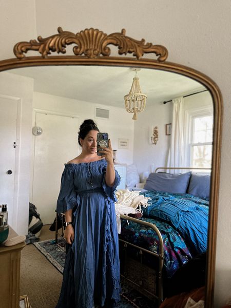 I’ll be living in this dress from free people 🦢🦋