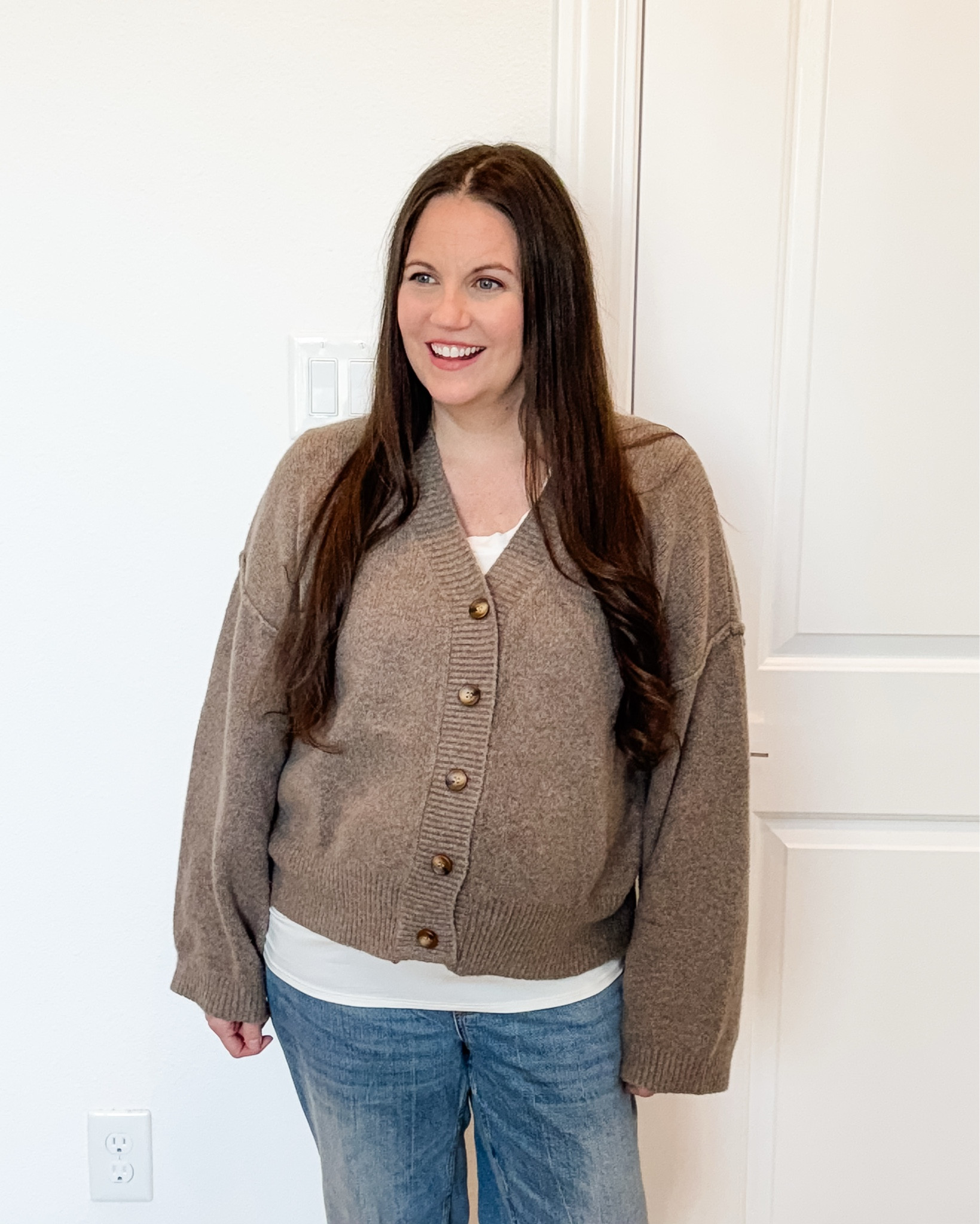 Here’s a simple but elevated fall outfit that transitions beautifully into a winter outfit. I’m wearing a light brown cardigan sweater layered over straight leg ankle jeans—such a timeless combo. Finished the look with light brown booties, but it also works perfectly with tan boots for winter.
As I build out my maternity outfits, this one has been in constant rotation. It’s bump-friendly, stylish, and works great for any winter lookbook or casual winter street style moment.
Such a reliable casual outfit for every day.


#LTKBump #LTKSeasonal #LTKootd