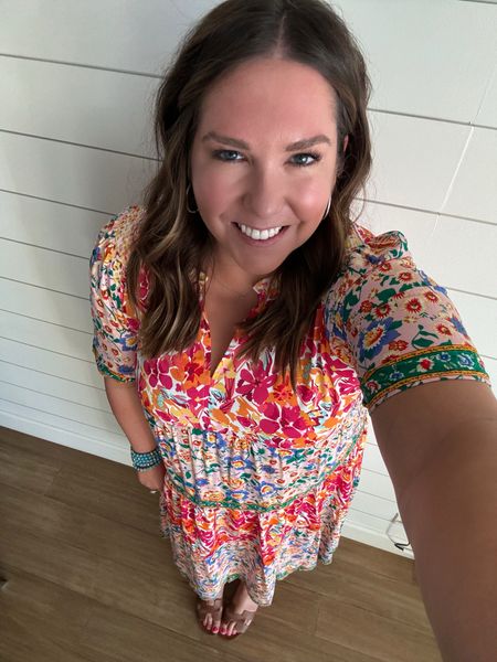 My dress for family photos in Maui. I loved all the bright colors and different patterns in this dress. It’s unfortunately unable to be linked. I also styled it with simple jewelry and a stack of bracelets to coverup my Apple Watch tan. They were perfect for covering it and still being stylish. Kept my shoes simple and easy to take off at the beach  

#LTKfindsunder100 #LTKstyletip #LTKshoecrush