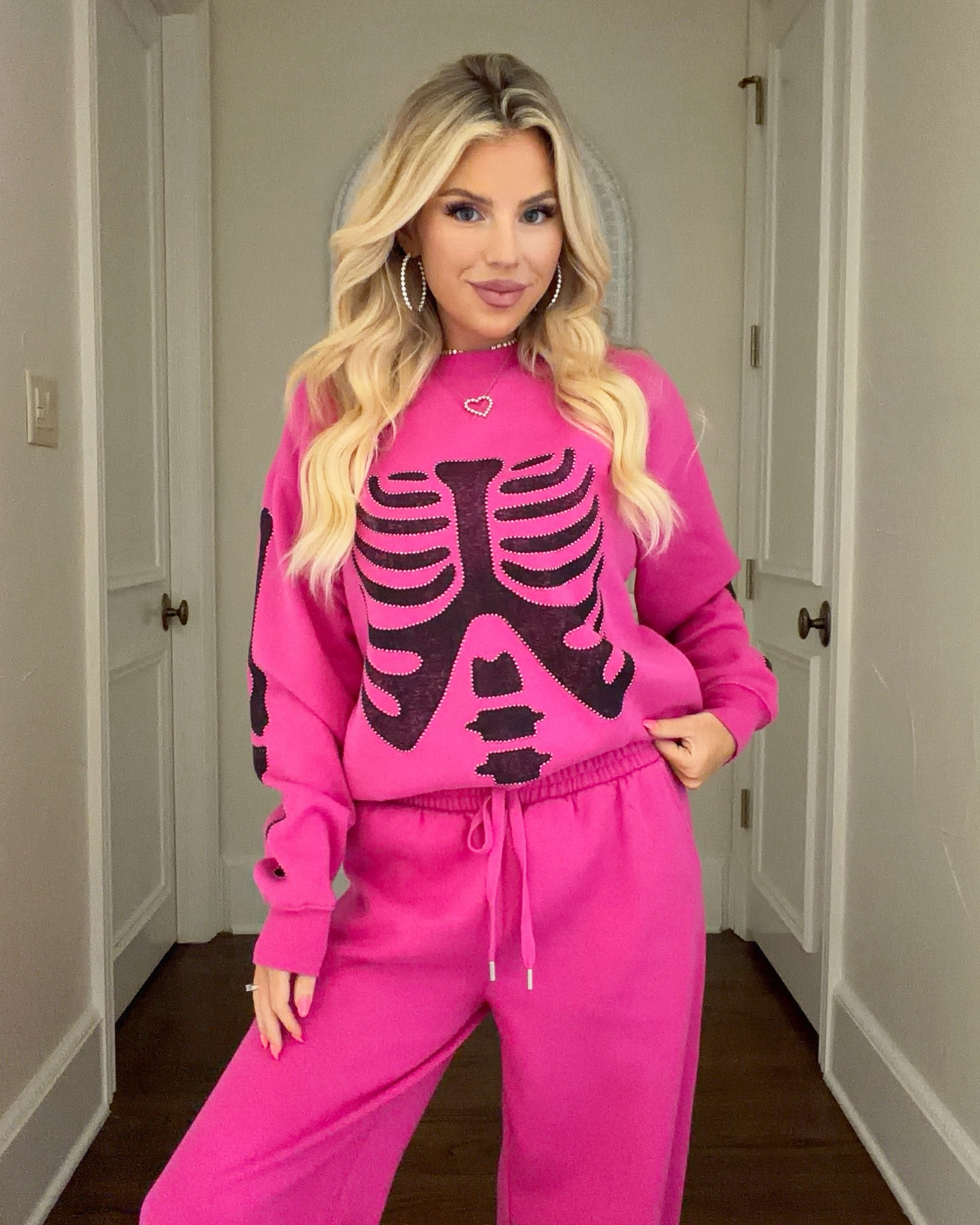 Pink Halloween lounge outfit. Skeleton sweatpants sweatshirt tank top