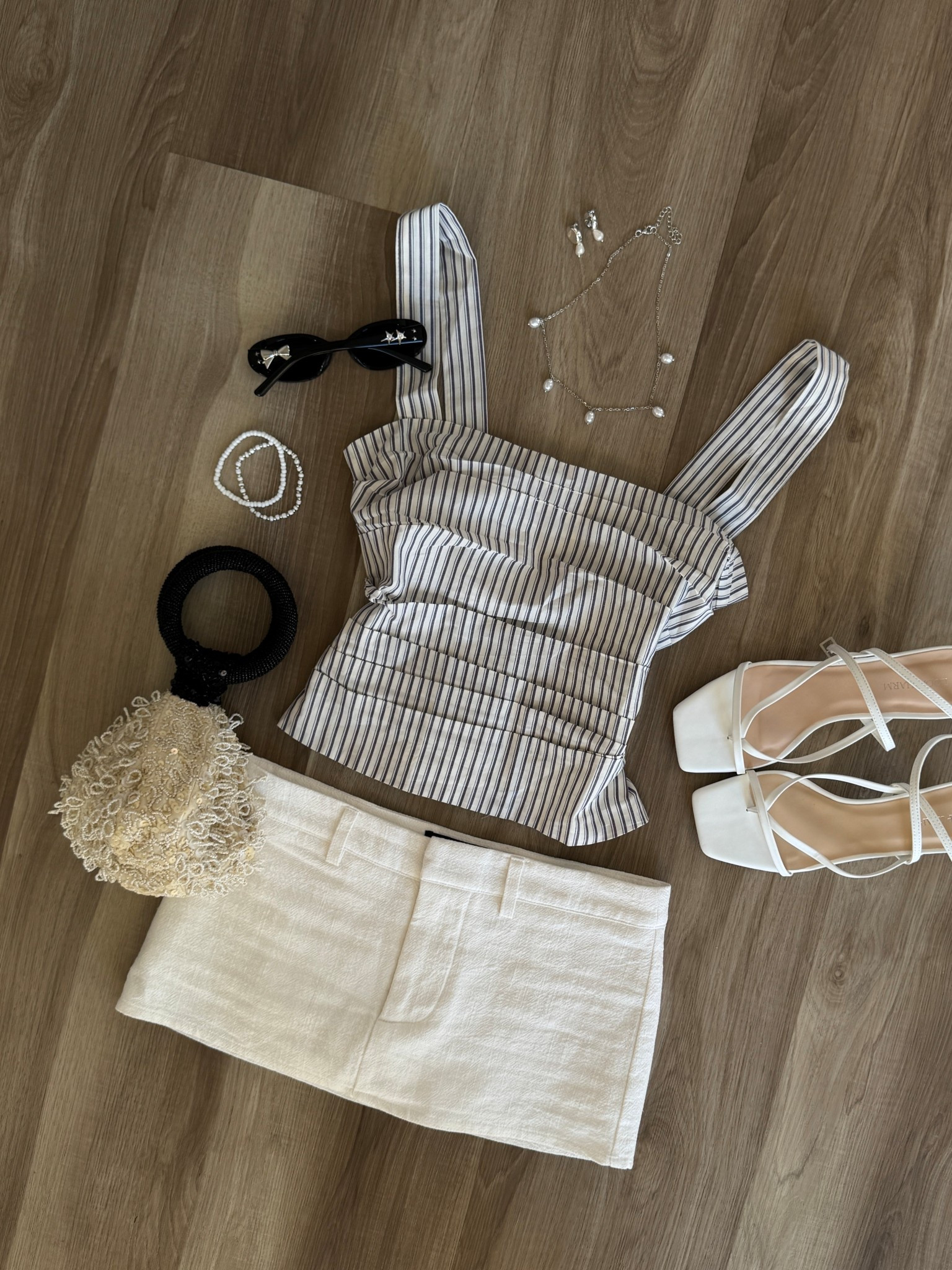 summer vacation outfit inspo

top&skirt: lionness
purse: zara
heels: amazon

#LTKStyleTip