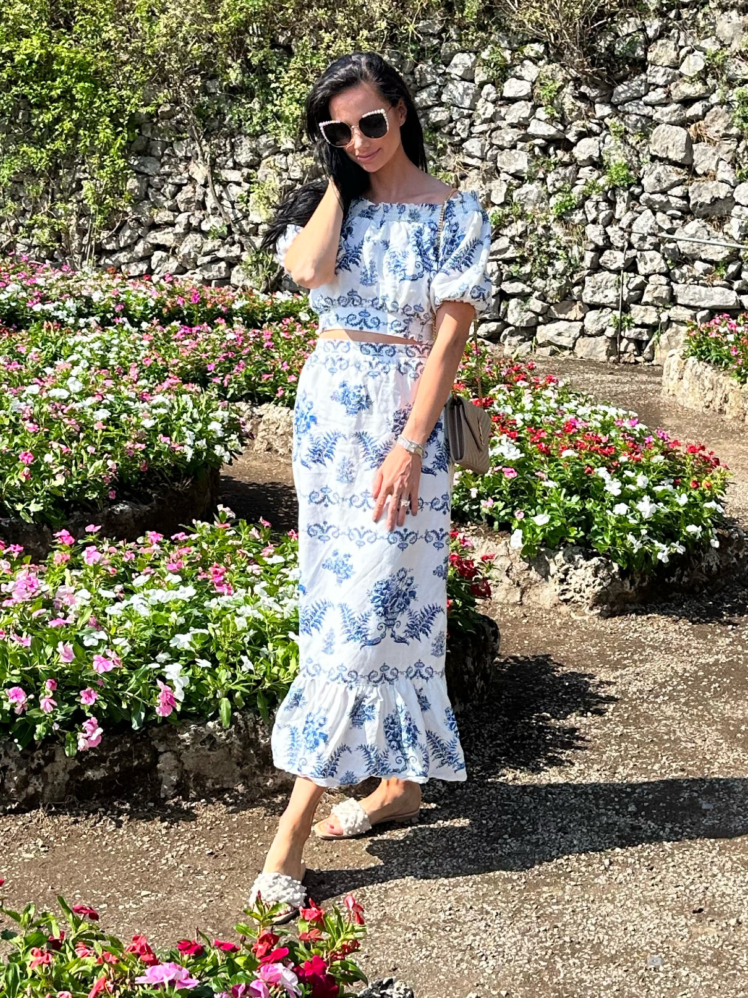 Explored Villa Rufolo in Ravello today in this off-the-shoulder puffed sleeve floral linen crop top and matching maxi skirt. So airy and light. These slides are the perfect shoes to do some walking in Italy. 

#LTKeurope #LTKtravel #LTKstyletip