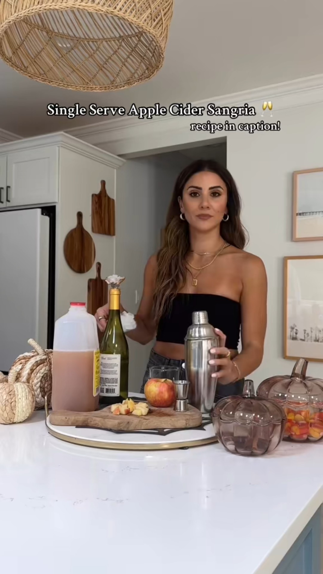 So now you can have a glass while you make the party batch!!! For the full recipe head to the "Halloween Decor & Recipes" section of my welcome page! Single serve recipe is below🍎👇🏻
-
Single-Serve Caramel Apple Cider Sangria:

Ingredients:
3 oz apple cider
2 oz white wine (Pinot Grigio or any other preferred white wine)
1 oz caramel vodka
1/4 of an apple, diced
1 cinnamon stick
Ice cubes

Instructions:
1. In a mixer, combine ice, apple cider, white wine, and caramel vodka.
2. Add the diced apple
3. Shake to mix everything together.
4. Add a cinnamon stick & enjoy