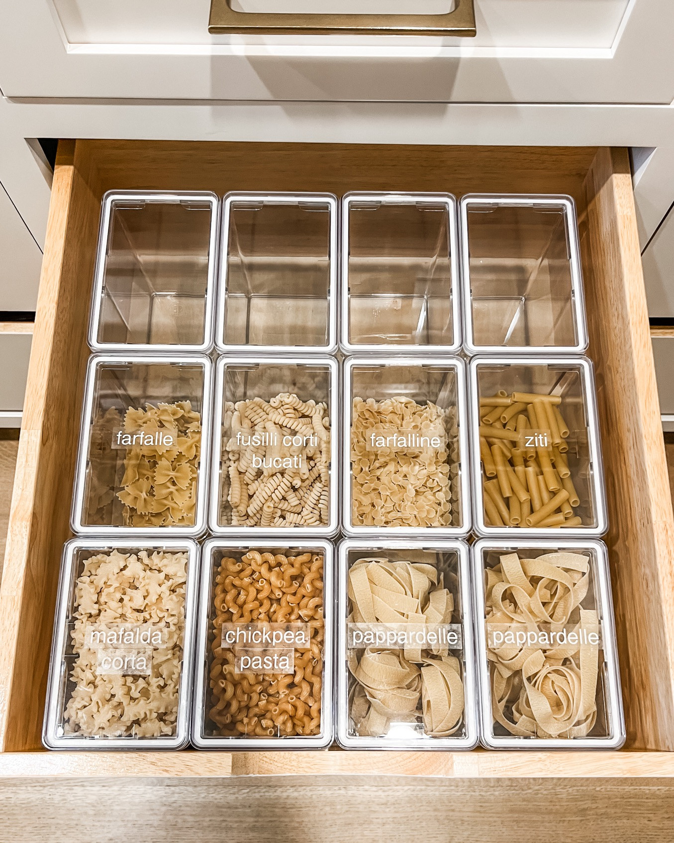 When you think of clear containers in a pantry, you're probably picturing them on a shelf. However, the lids are clear too, so they can also be put in a drawer and still be just as useful! By labeling the top of these, there's no confusion about what belongs in each one, and the clear lid allows a quick glance to see what (and how much!) is inside. 

If you need some creative solutions in your pantry, let us know! We'd love to help. 

 