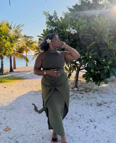 Island goddess energy. An olive halter dress with a wrapped waist that skims the curves and moves beautifully, perfect for midsize petite beach nights. 

 #LTKMidsize #LTKPetite #LTKTravel