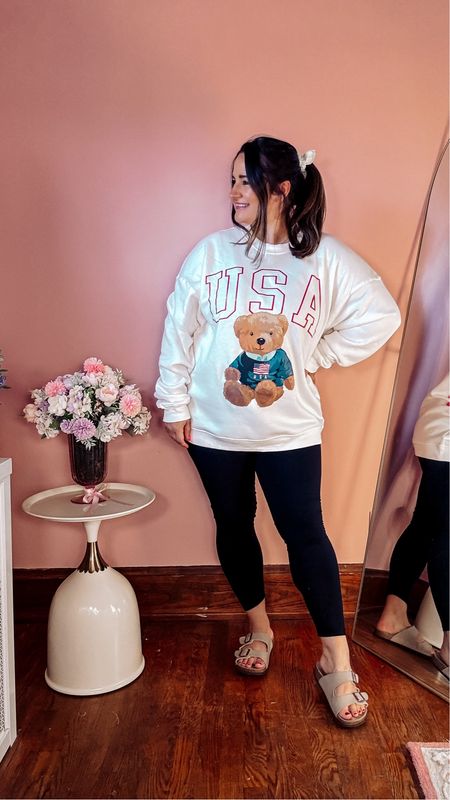 THE cutest USA sweatshirt with the cutest little teddy bear! Wearing a size xl for a comfy outfit look.

Paired with my favorite black leggings and comfy sandals

Midsize
Curvy
Comfy outfit
Athleisure
Target find
Amazon find 
Birkenstock
Luxe for less 

#LTKTravel #LTKMidsize #LTKSaleAlert