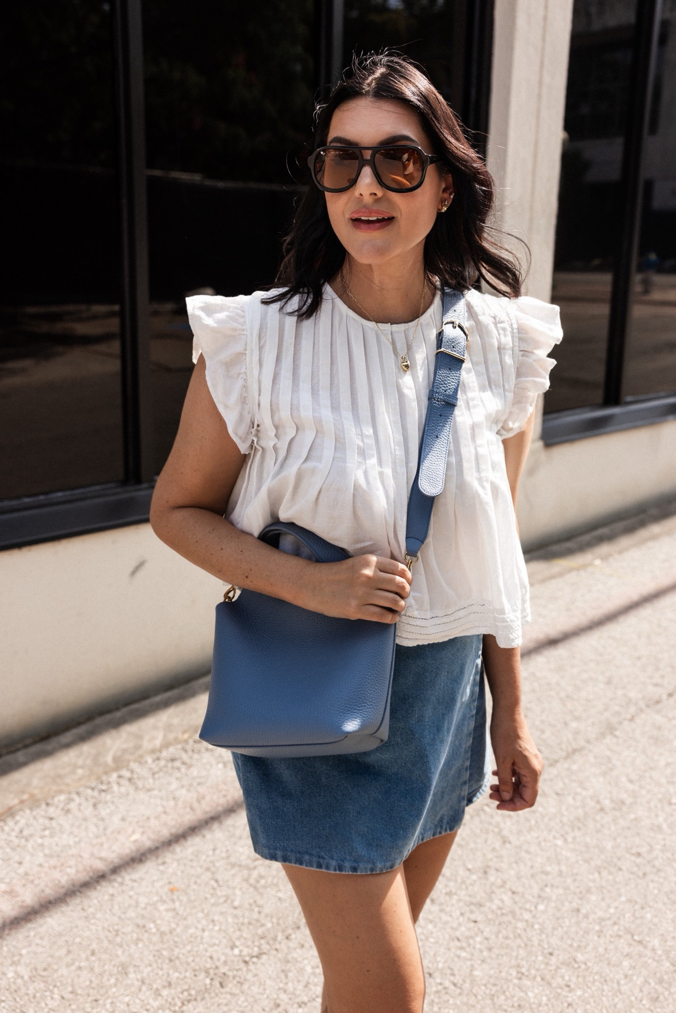 This @cuyana leather tote is the best little mini bag! I love this light blue too, it reminds me of denim so it of course goes with everything! 

Use code ANTHRO20 to save 20% on the top! 

 