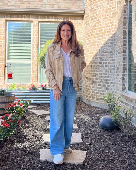 Here's a casual spring outfit idea! Wide-leg jeans with patch pockets, a white tee, and a cropped camel jacket. I paired it with my favorite Adidas sneakers. Accessories are gold beaded stretch bracelets, the necklace is the Parker from Gorjana with a pearl charm, and my initial charm. Jeans are copped on others and longer on my petite height. Wearing size 25 as they have a bit of stretch.
#springfashion #outfitinspo #capsulewardrobe #midlifestyle

#LTKshoecrush #LTKstyletip #LTKSeasonal