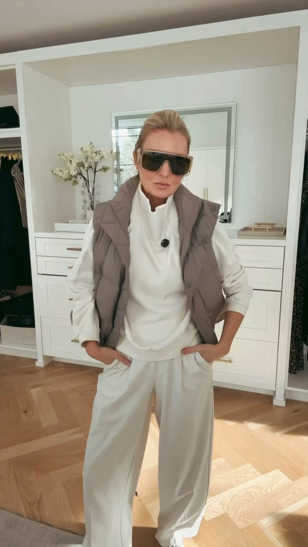 How cute is this cropped puffer vest? Comes with a detachable hood. TTS. I’m wearing xs. 