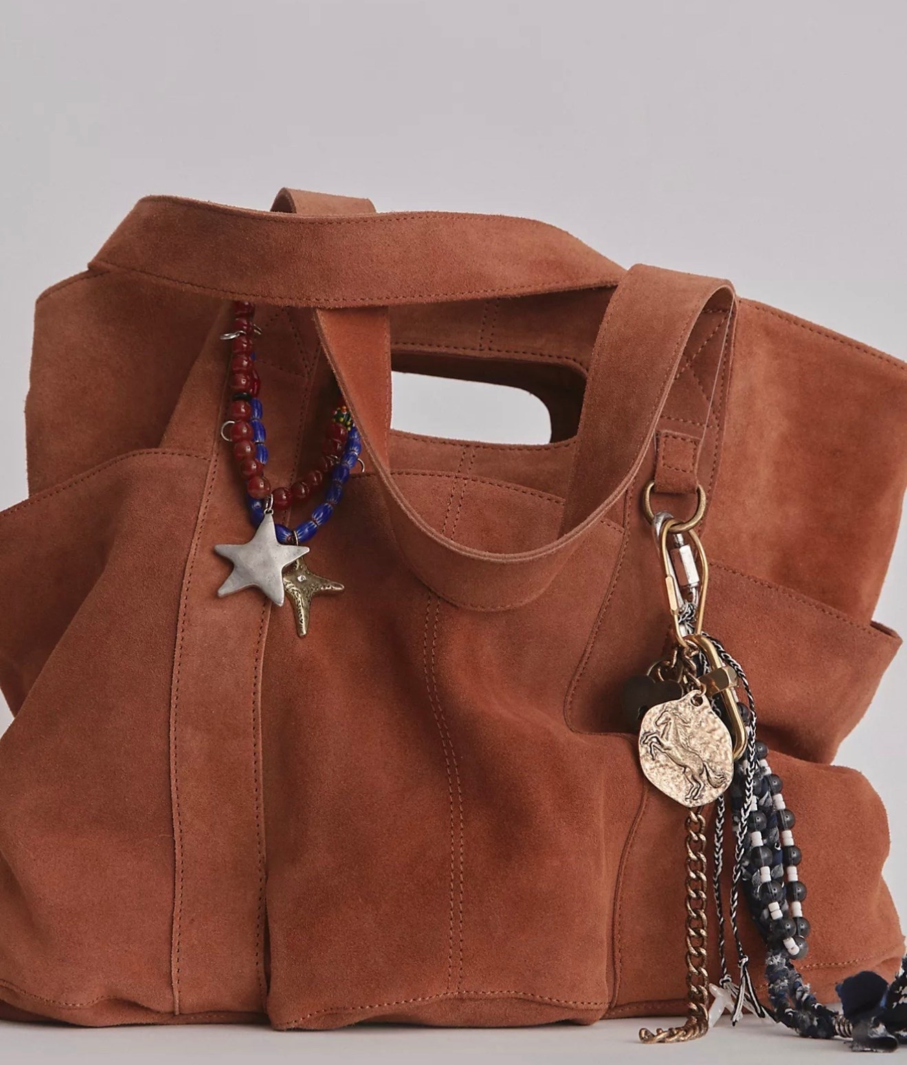 Suede Caravan Tote

Designed to be your daily bag to take you from the workday to the weekend, this totally timeless tote is featured in a staple square silhouette and stunning suede fabrication with defined pocket detailing and double top handles for added functionality

#LTKootd #LTKTravel #LTKWorkwear