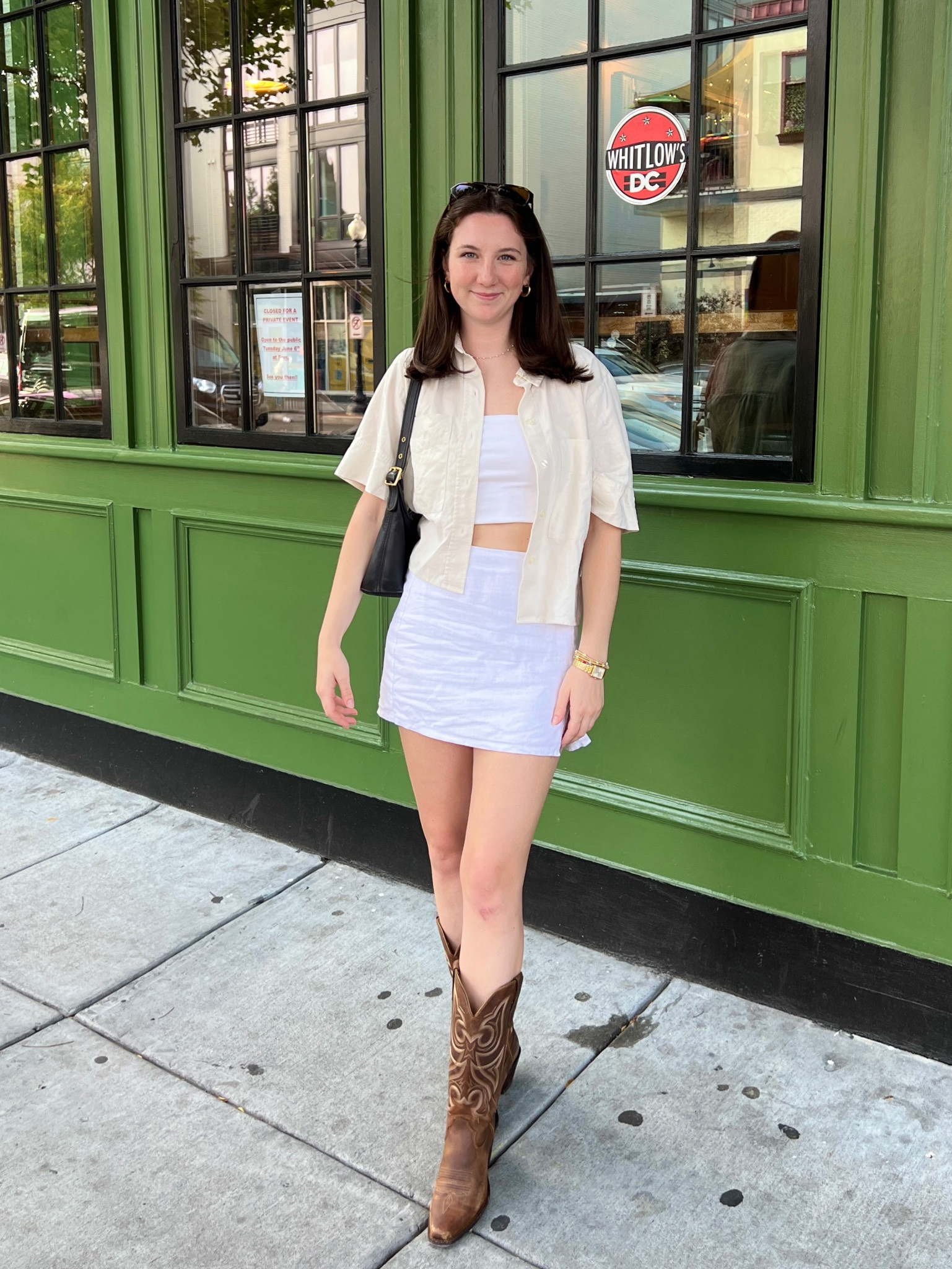 Summer western style outfit with cowboy boots, white crop top, levis cream button up, and white mini skirt 

#LTKSeasonal #LTKfindsunder100