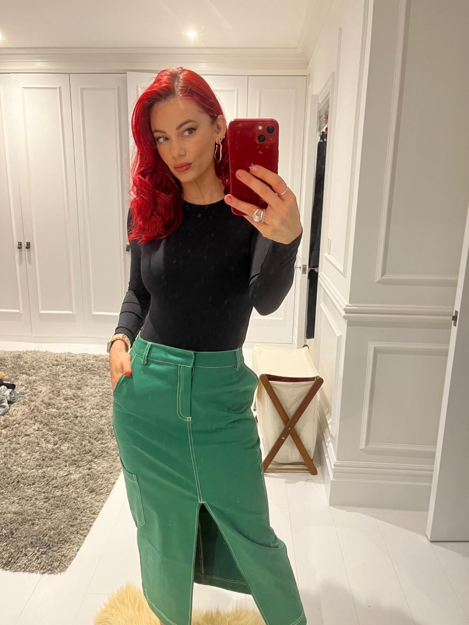 Green cargo maxi skirt, black long sleeve bodysuit 

#LTKeurope #LTKSeasonal #LTKstyletip