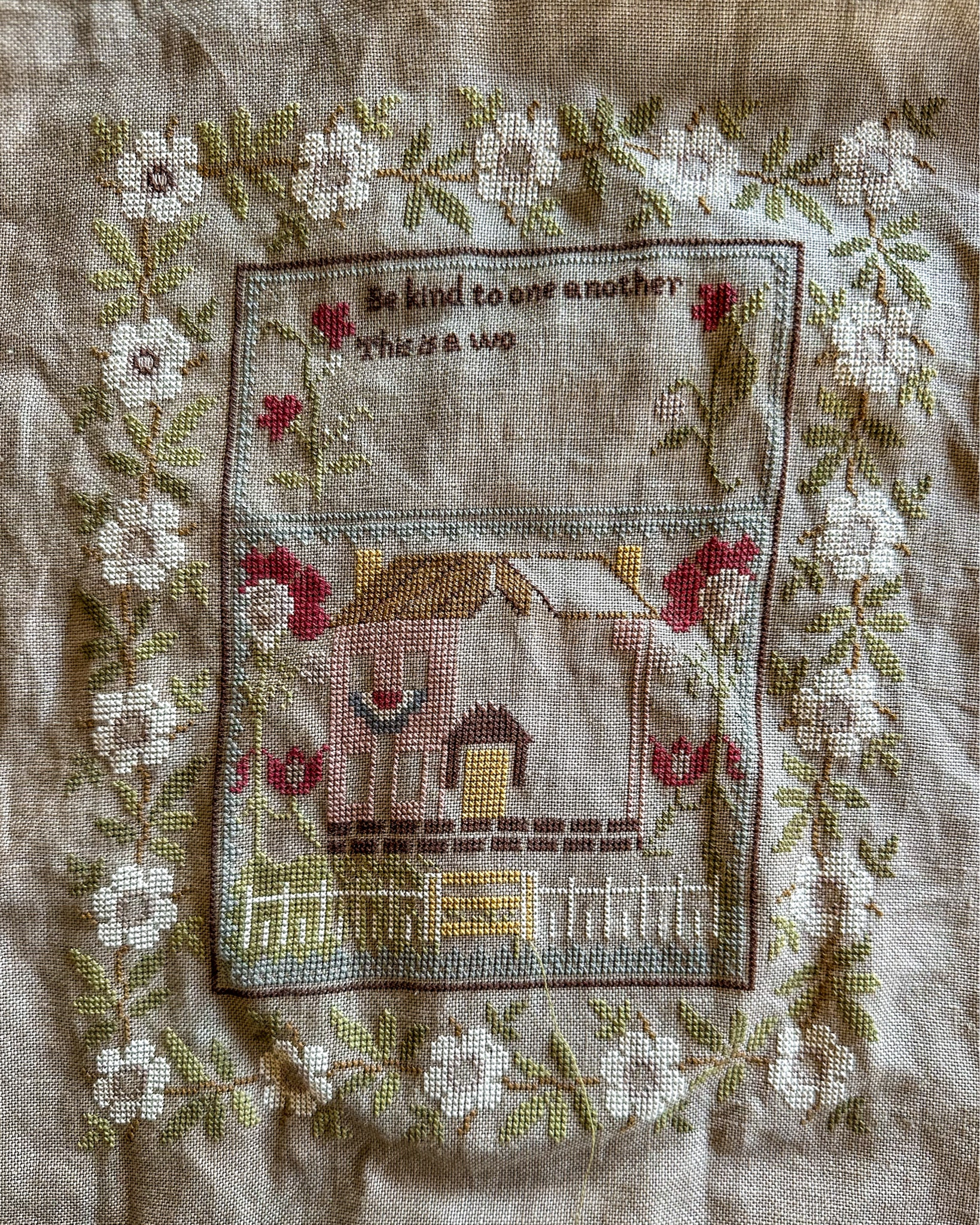 More progress on my Be Kind Sampler. 
I started stitching the one over one yesterday and man, were my eyes exhausted just after this bit.
I decided it was enough for the day and worked on the grass underneath the pink house. 
The pink house is probably one of my favorite things about the design. Never seen a pink house like it before. 
Will be adding more stitching to her today, wanted to share my progress though. 
Love y’all mucho. 🫶🏻
Happy stitching. 🧵 
.
Pattern: Be Kind by Stacy Nash 
Floss- Converted to DMC 
Fabric- 36 Linen, R&R Reproduction 18th Century Rook

#LTKSeasonal #LTKOver40 #LTKHome