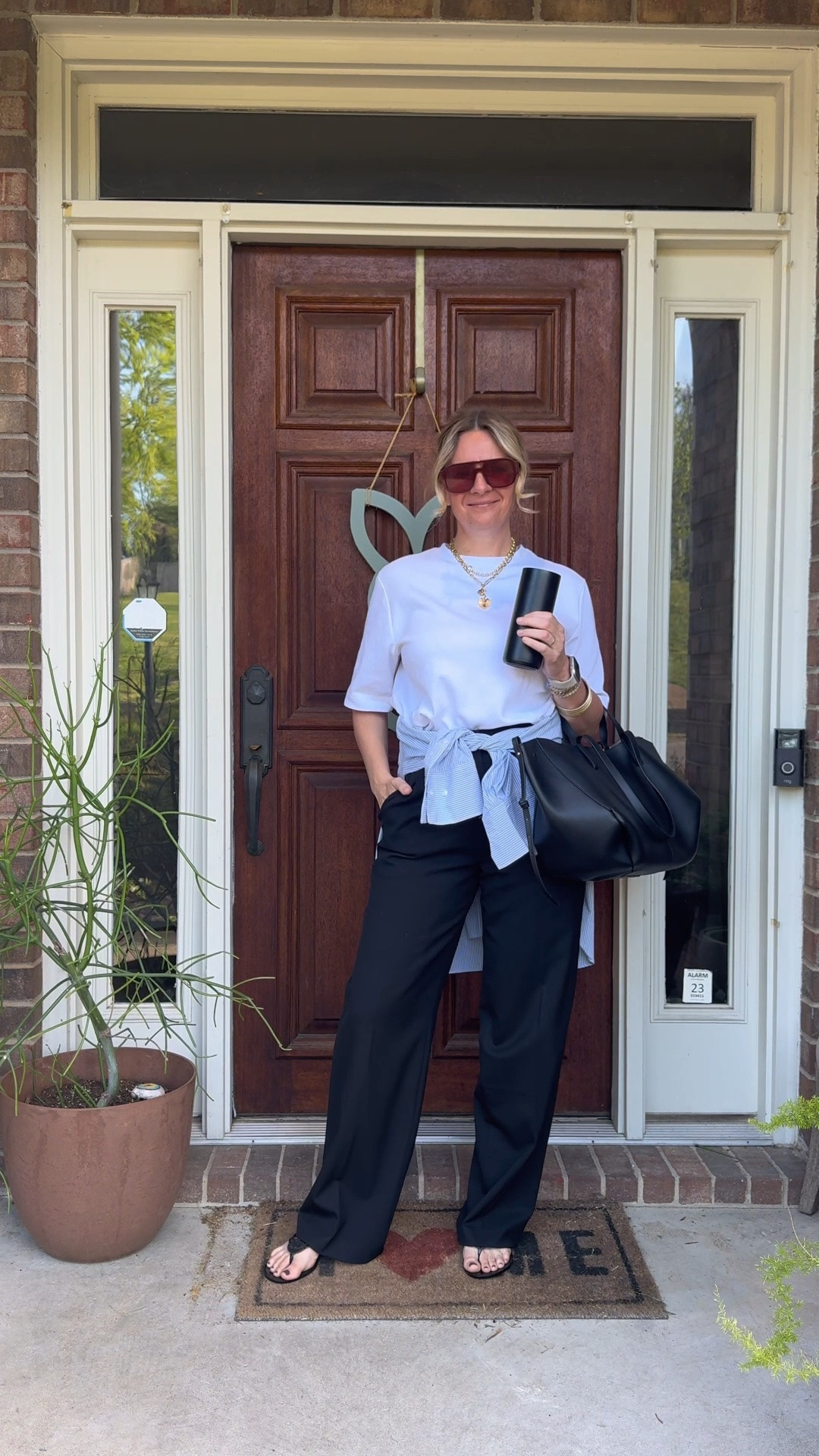 OOTD for an easy weekend ✨ Oversized white tee + black trousers + a shirt tied at the waist + black jelly flip flops. All from my own closet — linked the closest versions I could find. Everything shoppable below! 👇

#LTKdayinmylife #LTKootd #LTKOver40