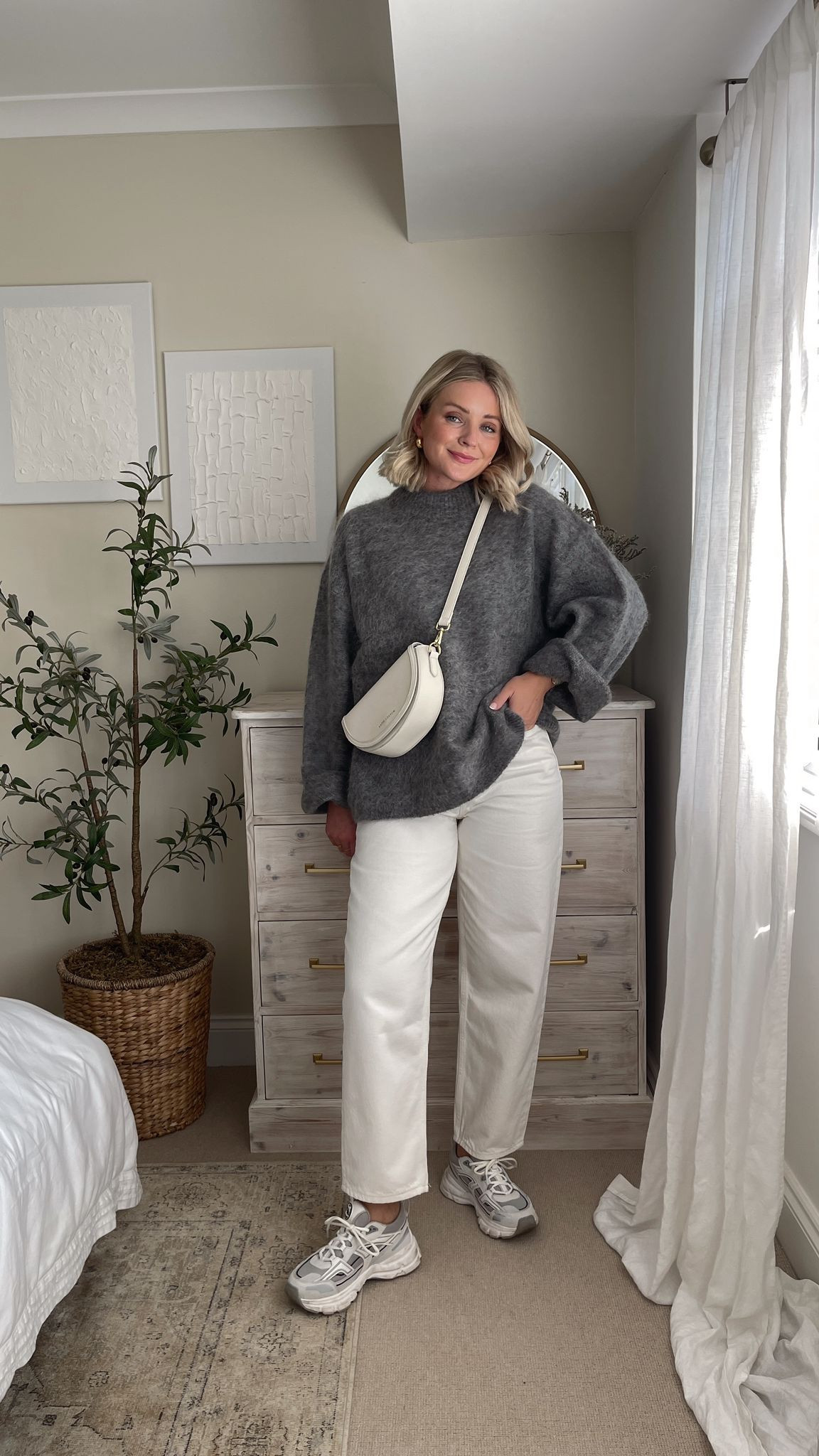 Styling grey for autumn - H&M alpaca jumper, white cos tapered jeans, axel arigato trainers & Katie Loxton half moon bag  

#LTKSeasonal #LTKeurope #LTKstyletip
