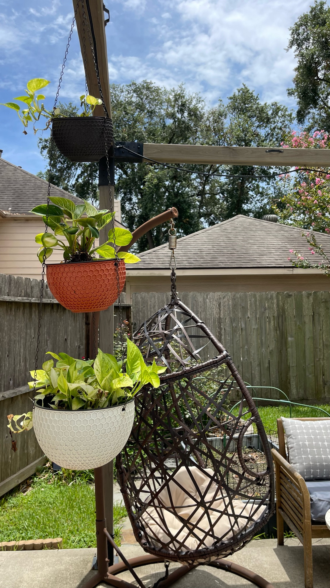 Hanging planters for outdoors and swinging hanging outdoor egg chair complete the perfect summer backyard oasis by providing fun seating and bit of greenery to look at. It makes the patio a place our family want to hang around! 

#LTKHome #LTKSeasonal
