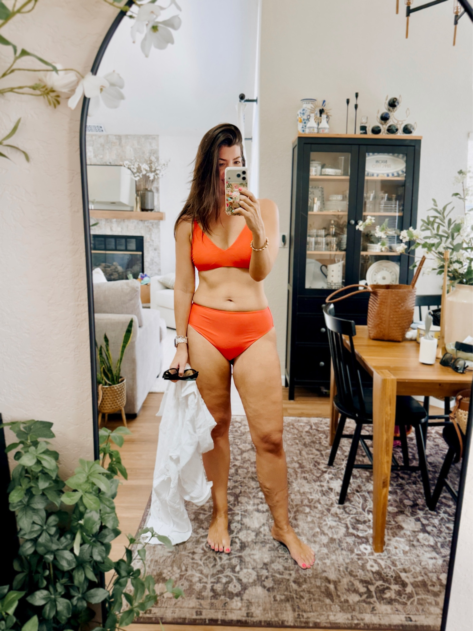 In a medium swim top and large swim bottom

#LTKSaleAlert #LTKMidsize #LTKSwim