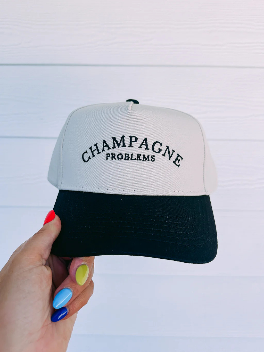 champagne problems trucker hat | Etta & East