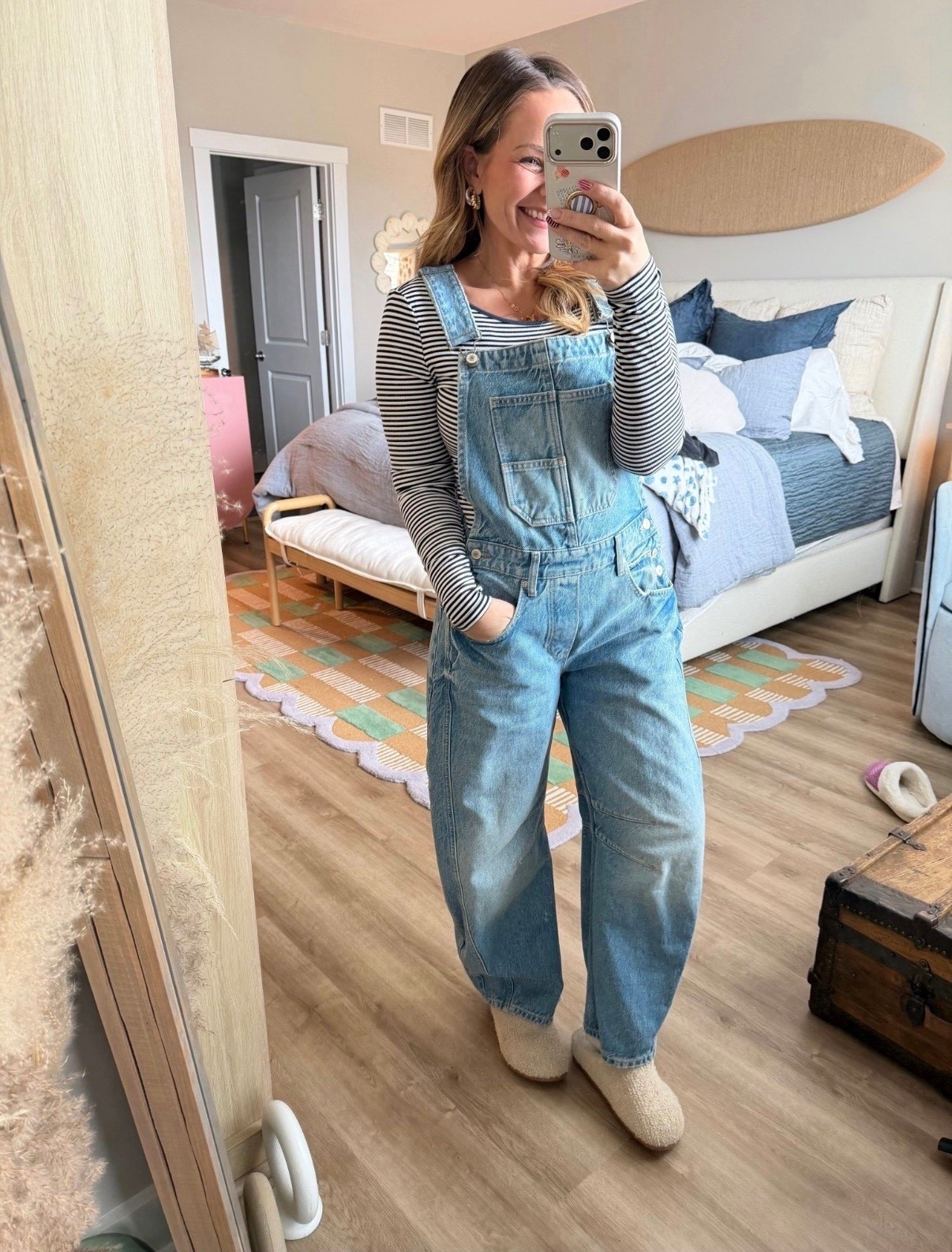 Okay this is peak effortless cool girl energy 👏🏼

Overalls are officially back and I’m not mad about it. These are the perfect relaxed fit — not too baggy, not too stiff — and they layer so well over a simple striped long sleeve. Easy, comfortable, and somehow still looks styled.

Wearing with cozy slippers here, but you could swap for sneakers or clogs and instantly change the vibe.

Fit notes:
• True to size
• Soft denim with structure
• Relaxed wide leg (so flattering)

Linking the overalls, striped tee, and slippers here 🤍 This is one of those outfits you’ll keep reaching for.