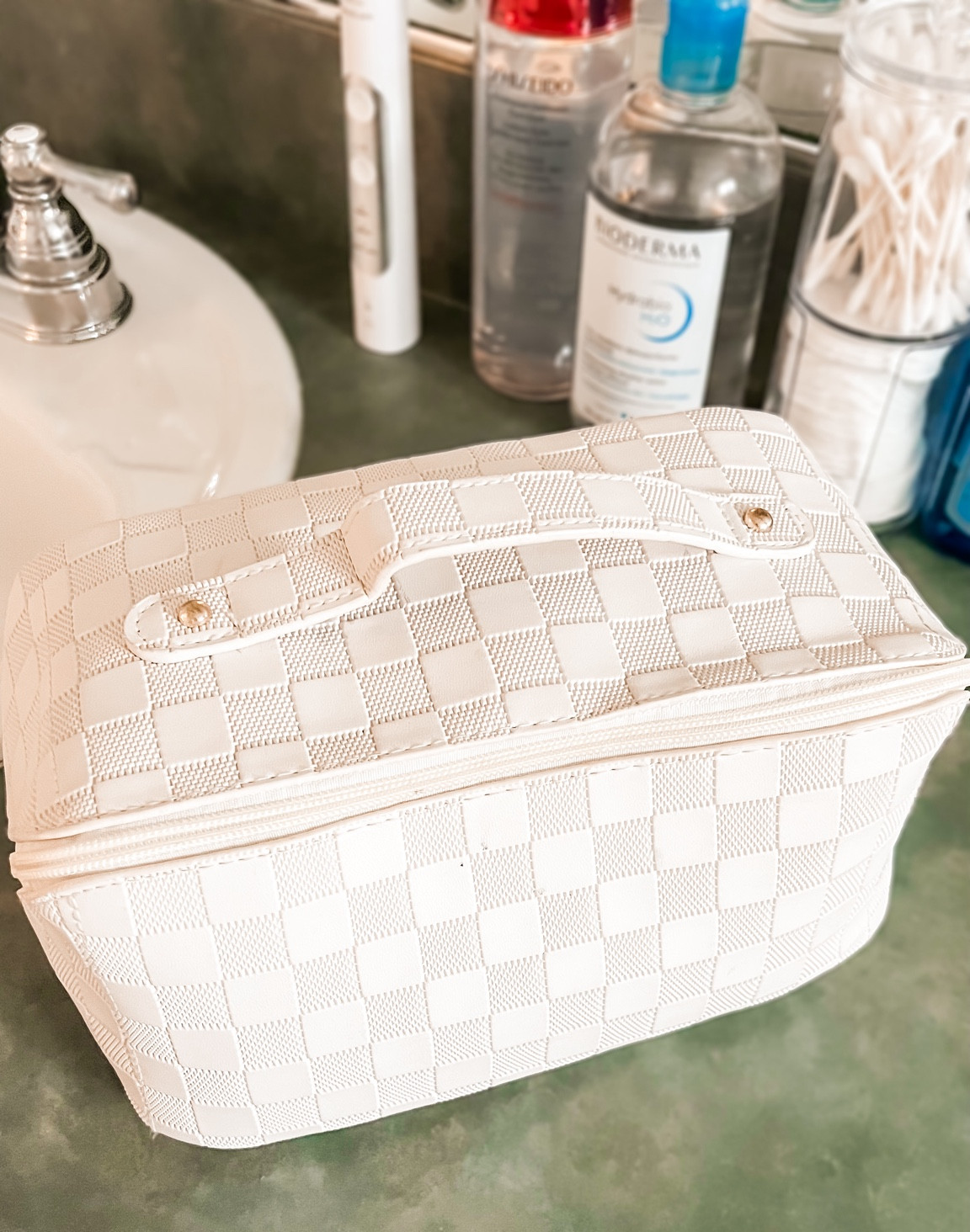 This large travel cosmetic bag is a must for all my trips. I love that it opens flat and fits full size beauty products. #cosmeticbag 

#LTKstyletip #LTKbeauty #LTKtravel