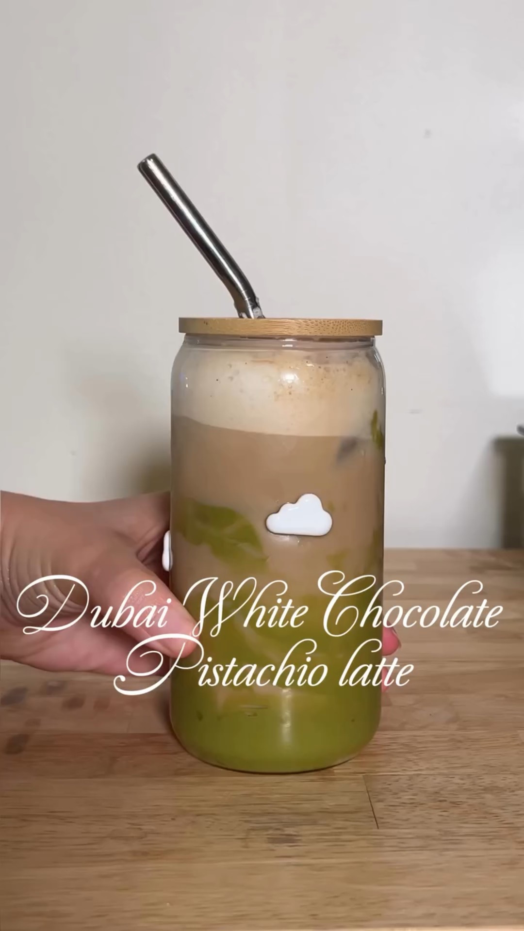 Dubai White Chocolate Pistachio Latte ☁️🍫💚☕️ I came up with this the other day and it is too good!! Let me know if you want more coffee/drink ideas and save this recipe/share with a friend who should try this! 

Recipe: 

•Line cup with pistachio butter and white chocolate syrup 

•Brew a double shot of espresso - I love the nespresso pistachio vanilla for this, but any would work! 

•Pour espresso into lined cup, add milk and ice 

•Top with cold foam 

Cold foam:

•Heavy whipping cream
•Vanilla bean syrup (homemade using equal parts sugar and water, Trader Joe’s bourbon vanilla bean paste)
•skim or 2% milk
•Froth until foamy 

#coffee #recipe #coffeeoftheday #dubaichocolate #coffeerecipes #nespressomoments #traderjoes