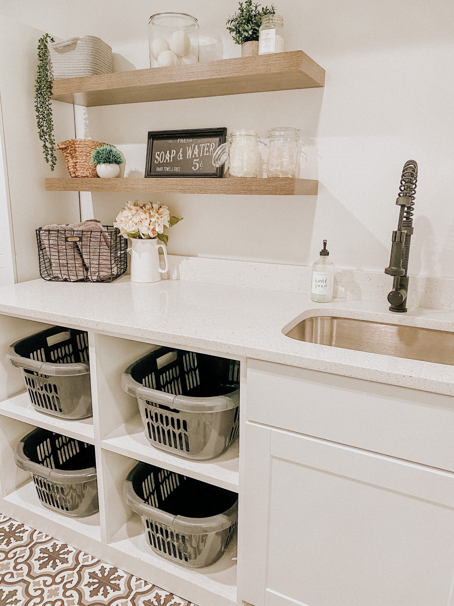 I think I'm officially at the age where I find my laundry room dreamy! 

Pretty sure this was the only time all these laundry baskets were empty. 🤪 It neverrrr ends. But having this space updated makes up for it (well a little!) 

#laundryroom #homeupdate #homerefresh #homedesign #homestyling #laundryroominspo 

#LTKOver40 #LTKHome #LTKdayinmylife