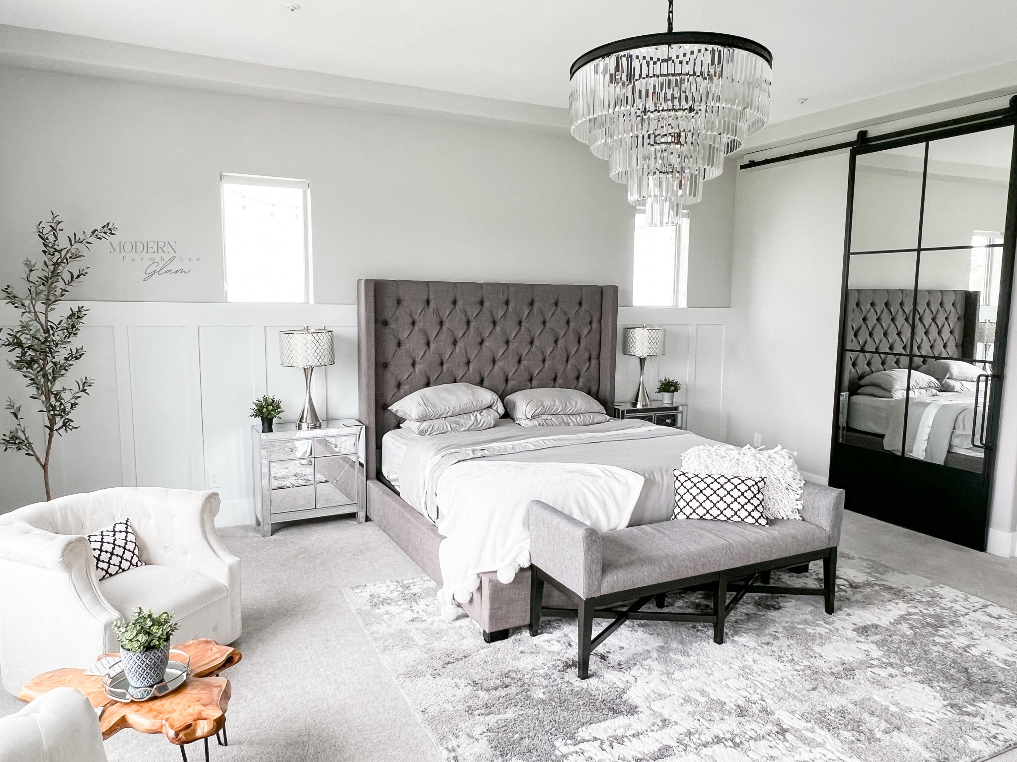 Master bedroom at Modernfarmhouseglam. 

Use my link for 40% off my bamboo sheets Code: FARMHOUSEGLAM40   
 Link: https://my.cozyearth.com/modernfarmhouseglam 
 

Gray and white rug, headboard, king size platform, bed, crystal chandelier, bench, white, swivel chair, nightstand, lamp, mirror, barn, door, sliding metal door, bedroom, furniture, home, decor, sheets, bedding. 

#LTKhome #LTKsalealert
