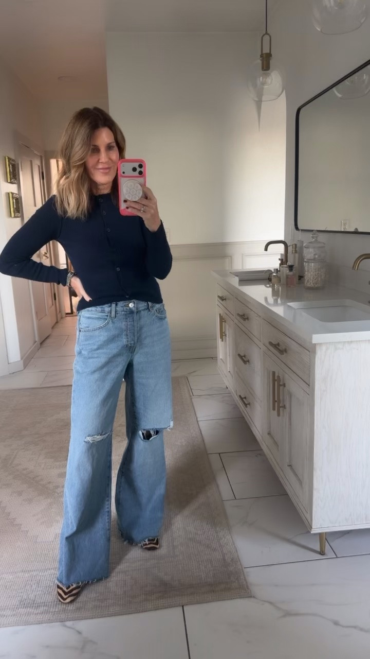 Vintage low slung jeans. I’m typically a 27 and sized down to a 26 and they’re still loose. I like the fit but consider sizing down 2! Wearing a small Walmart sweater

#LTKOver40 #LTKootd