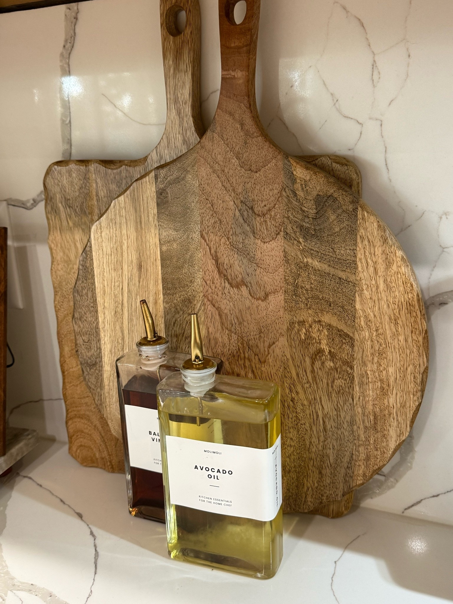 The little kitchen details make the biggest difference ✨ Loving these neutral oil & vinegar bottles styled with my wooden boards for that warm, elevated kitchen look. 

#LTKHome #AmazonHome #KitchenStyling #NeutralDecor #Parkerstyle_

#LTKHome