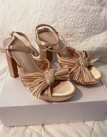 Gold satin platform bow heels 

#LTKFindsUnder50 #LTKFindsUnder100 #LTKShoeCrush