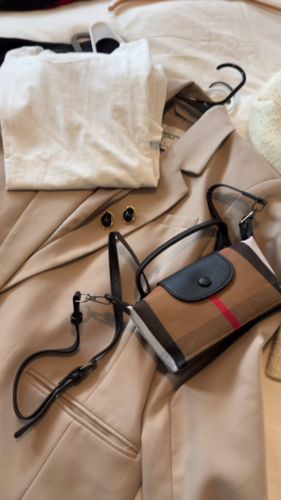 Packing business casual workwear for a work trip. 
Packing:
-tweed blazer
-cropped button down shirt
-blazer
-statement earrings
-crossbody bag

Wearing to
- work meeting 
- work presentation
- after work activities 

#LTKWorkwear #LTKootd #LTKTravel