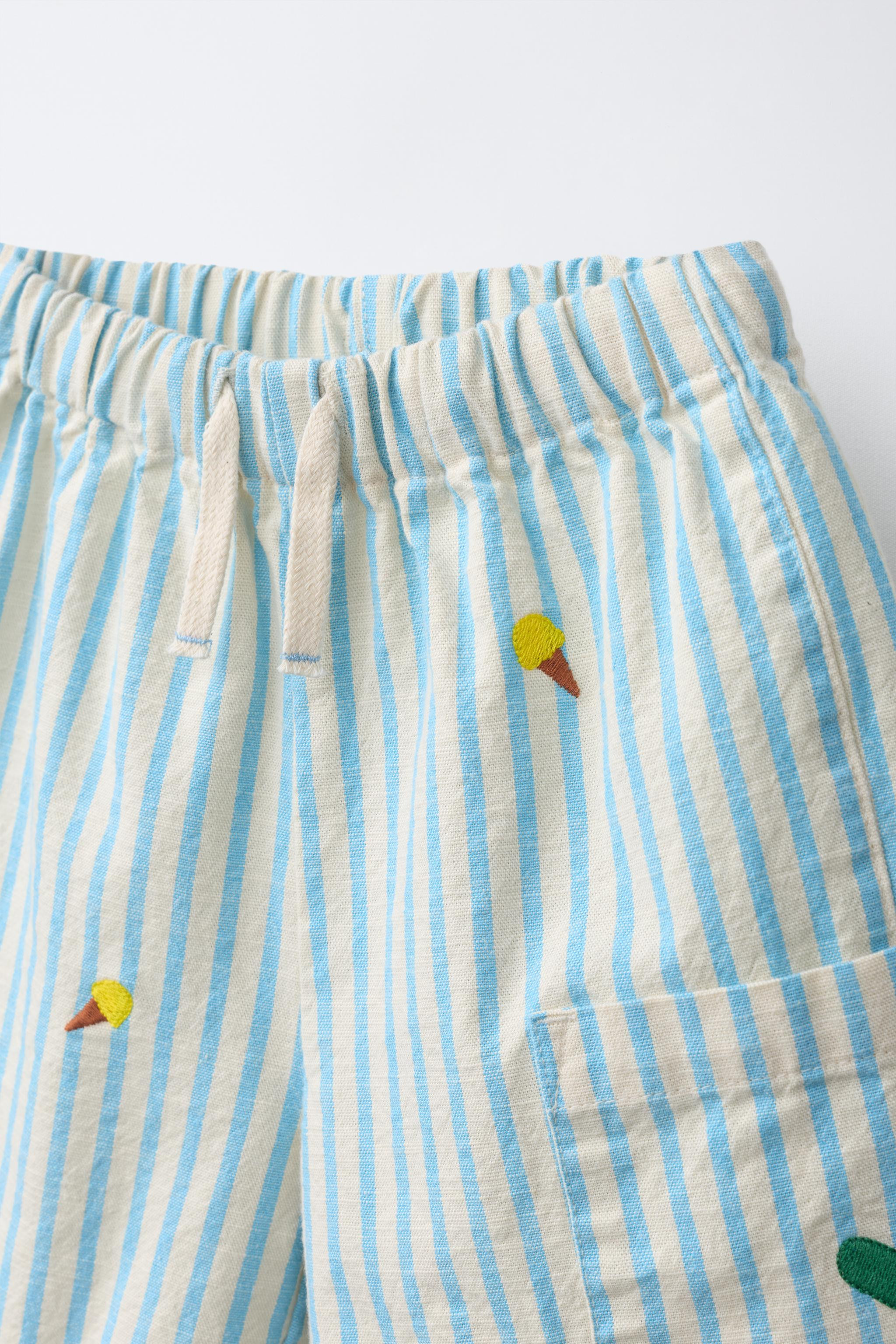 Bermuda shorts with an elastic waistband and adjustable drawstring at the front. Featuring patch ... | Zara UK