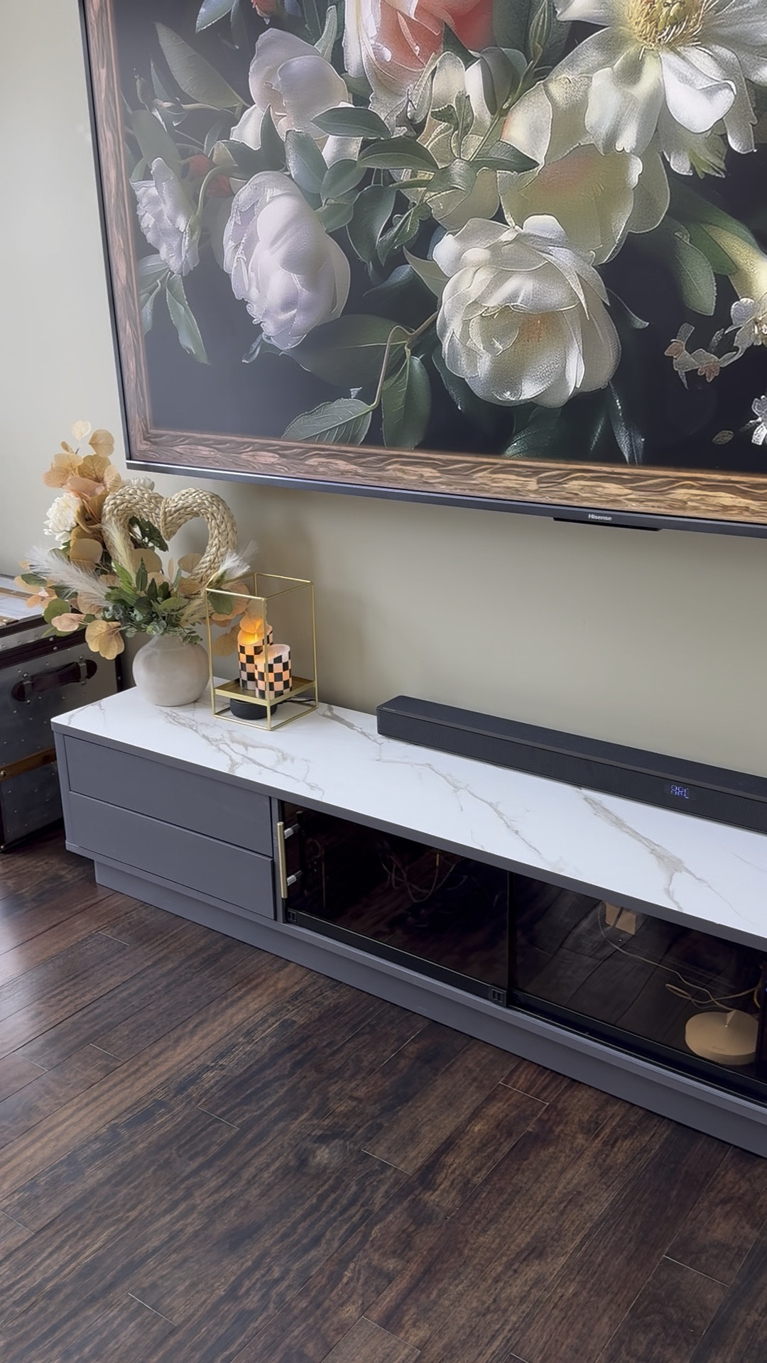 Living room decor. Modern home decor. Tv stand. Tv stand styling. Modern living room decor. 100 inch tv. Black and white living room decor. 

#LTKHome