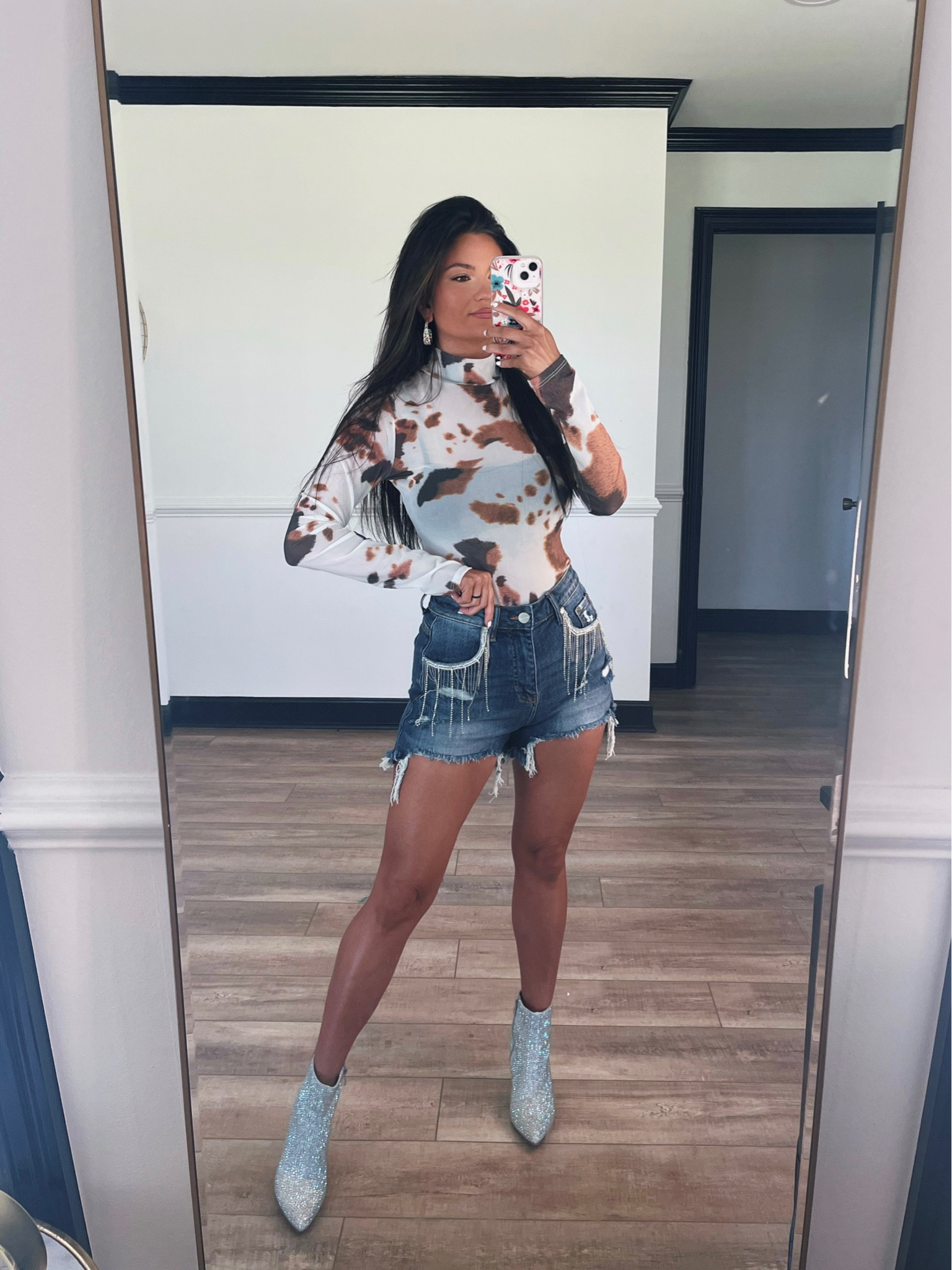 Whole lotta rhinestones! Rhinestone fringe denim shorts paired with mesh cow print top! These shorts are super stretchy 
LORI20 to save

Wearing smalls!

#LTKFestival #LTKsalealert #LTKstyletip