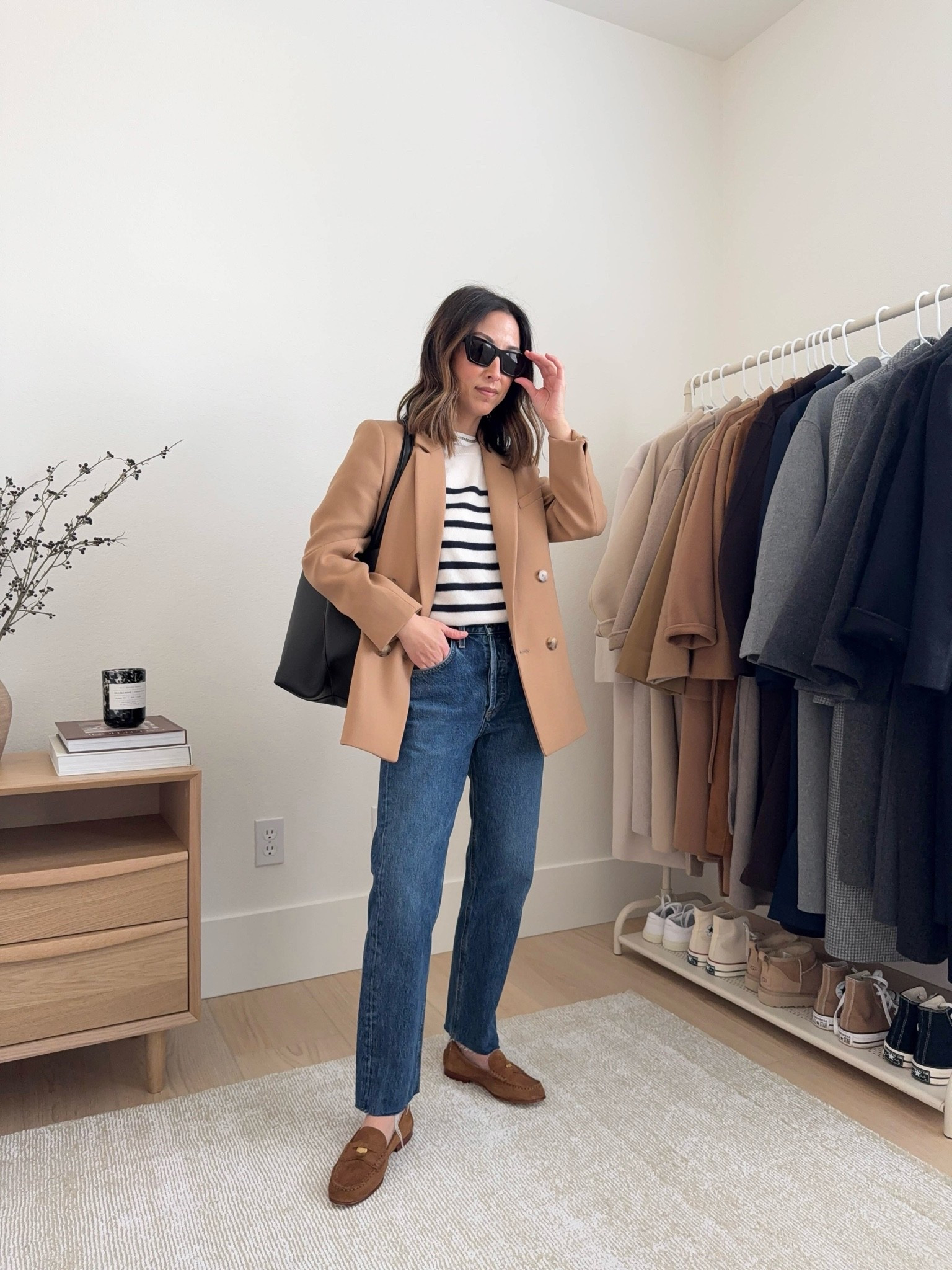 casual workwear outfit idea with jeans. 

Sezane Christie blazer 36. Sizes up for a roomy fit  
Banana republic sweater tee small
Agolde Parker jeans (old) 25. Linked similar
Veronica Beard loafers 5.5. Run tts 
Mansur Gavriel tote 
YSL sunglasses

#LTKPetite #LTKOver40 #LTKWorkwear