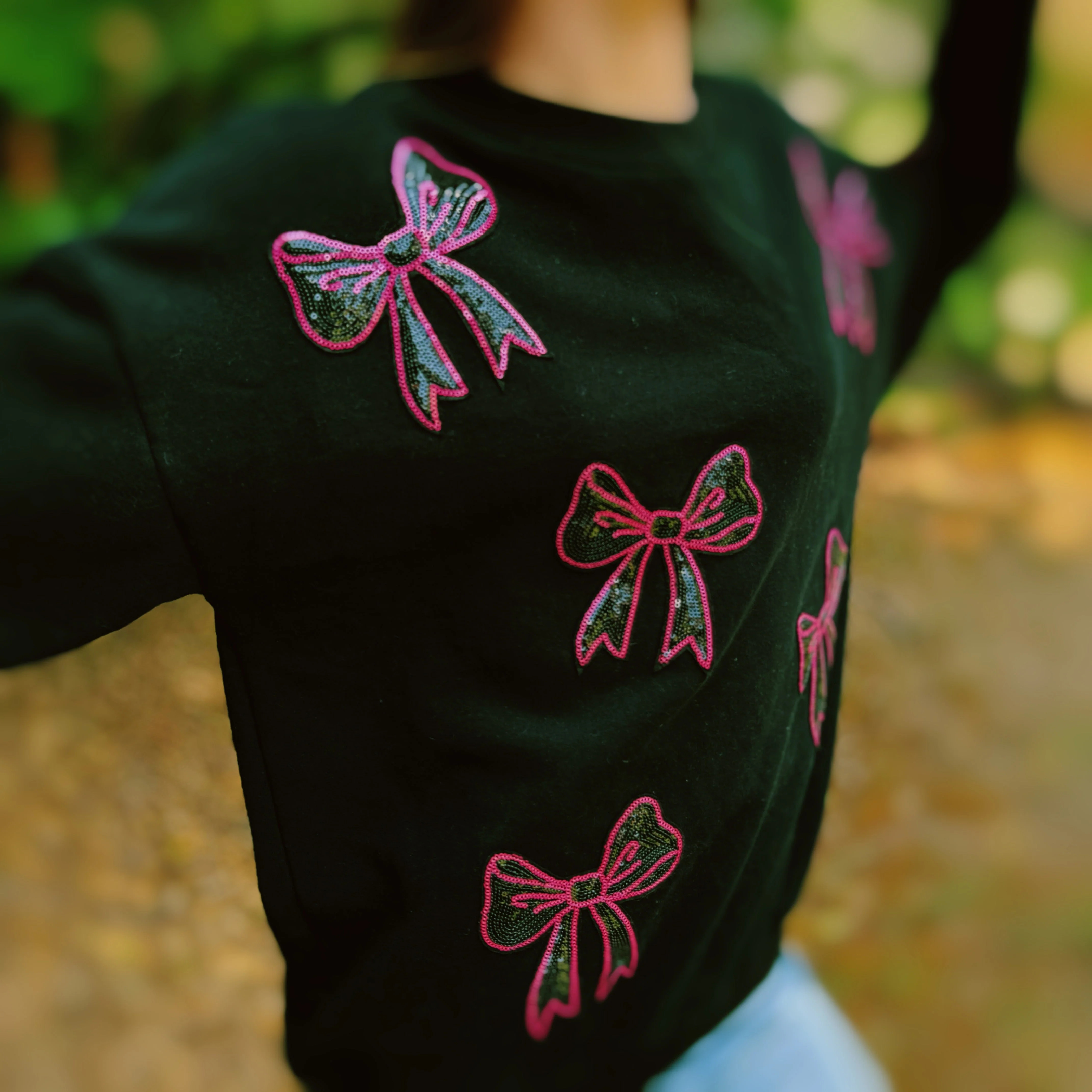 Sparkly Bow Patch Sweatshirt Black / M | Casual Chic Boutique