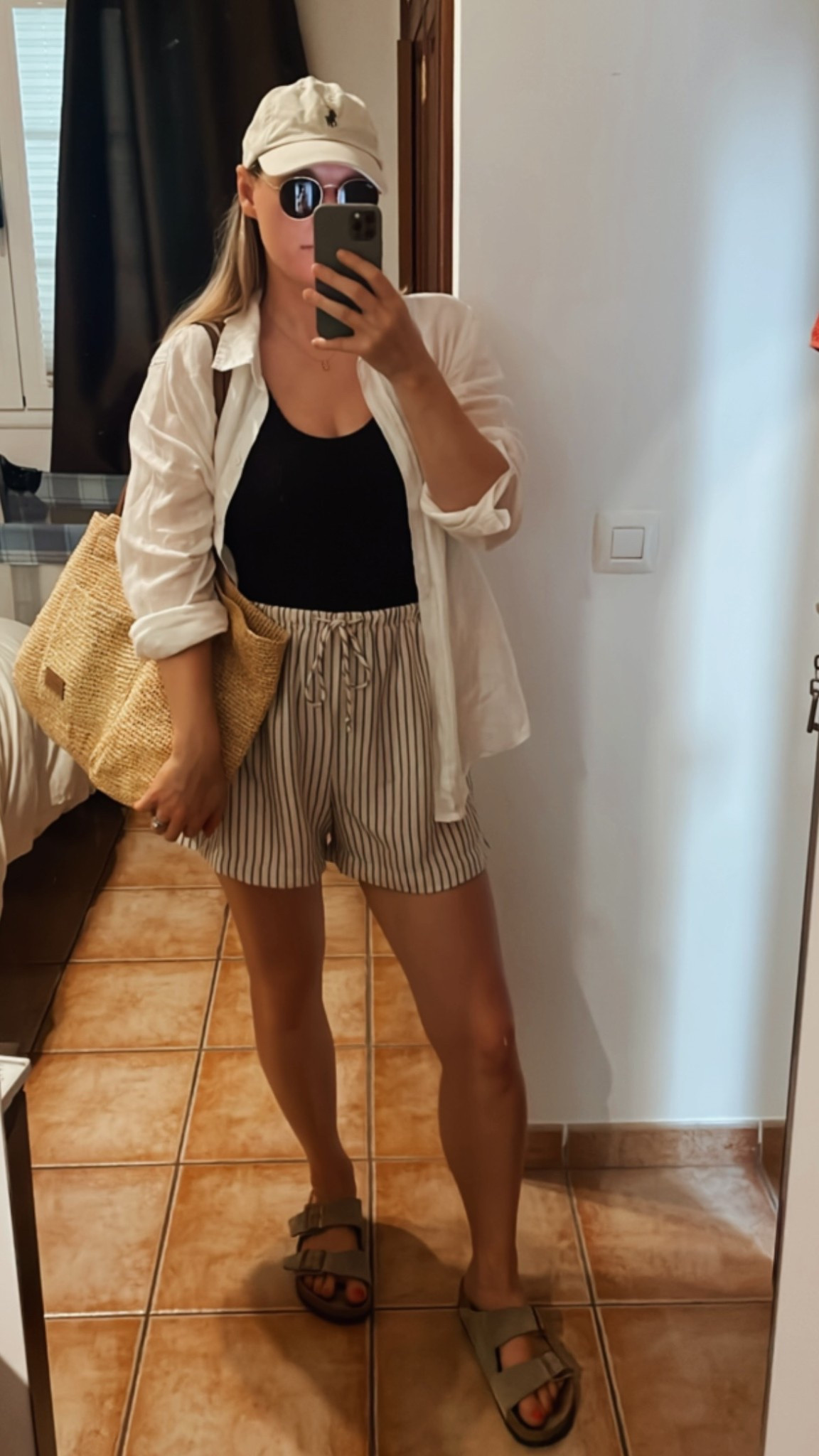 Holiday linen striped shorts & swimsuit with linen shirt and straw bag outfit! 

#LTKuk #LTKtravel #LTKeurope