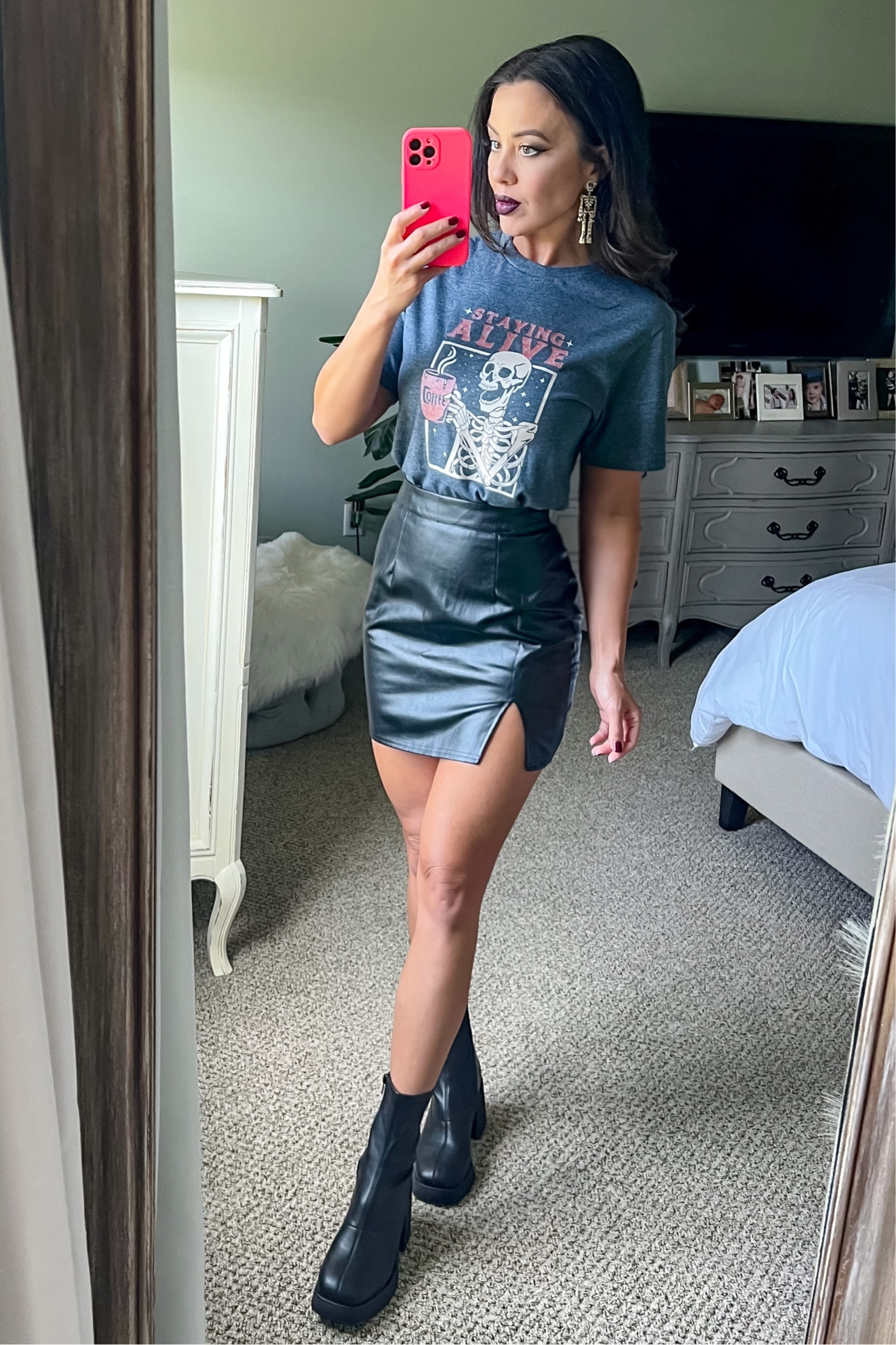 Halloween outfit. Halloween graphic tee. Leather skirt. Ankle boots. Black sock boots. Skeleton earrings  

#LTKSeasonal #LTKHalloween #LTKfindsunder50