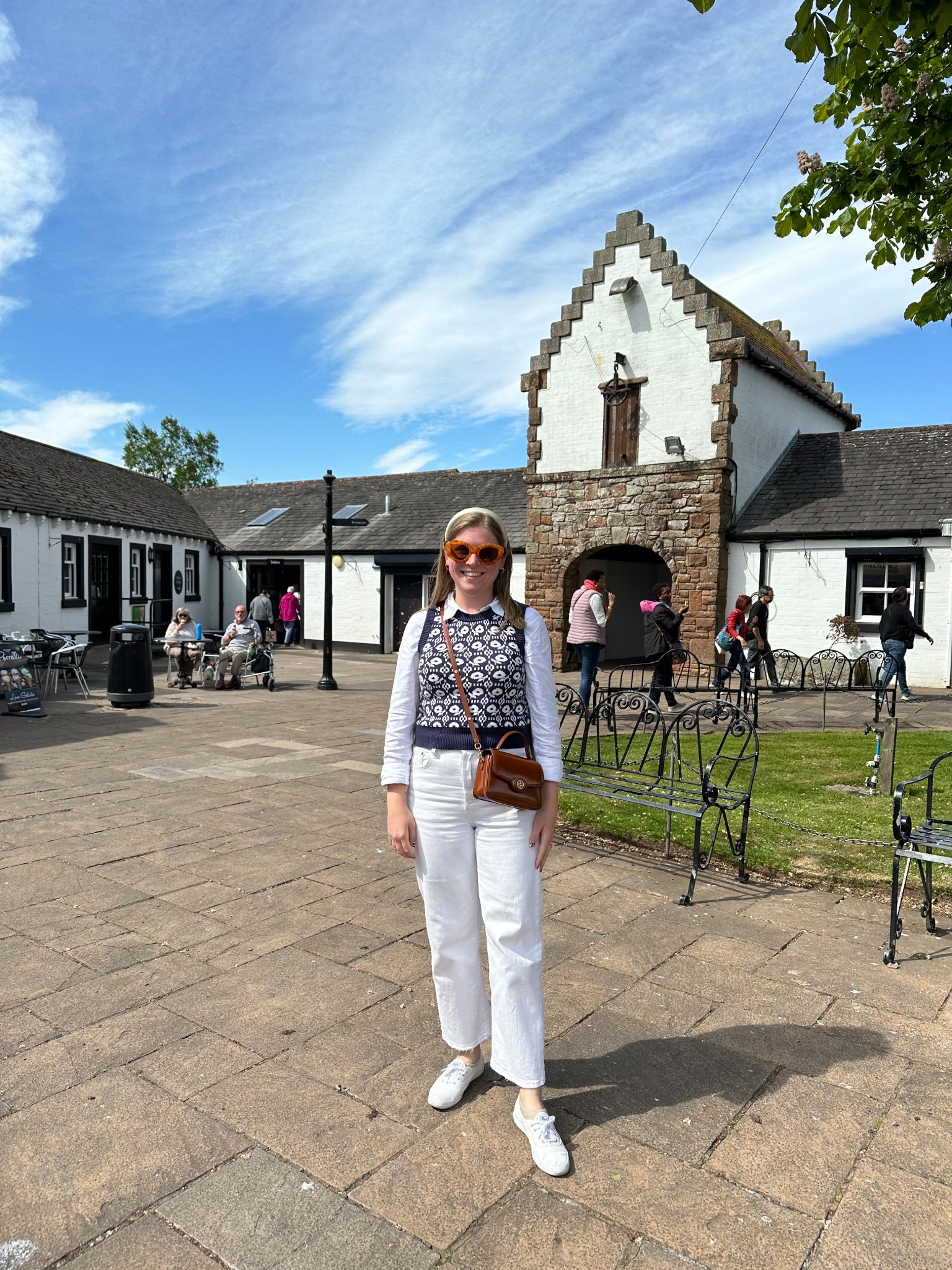 Pro Tip when traveling to the UK: Come prepared with layers! This sweater vest and jeans look was the perfect travel outfit to go from England to Scotland and a sunny spring day! 