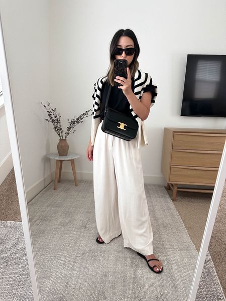 Polished spring outfits. My favorite linen trousers. Run tts. Great petite-friendly option!

Everlane tee medium
Z supply trosuers xs
Tkee sandals 5
Gap Factory sweater xs
Celine Triomphe medium 
YSL sunglasses  

Spring outfits, spring style, petite style, sandals 