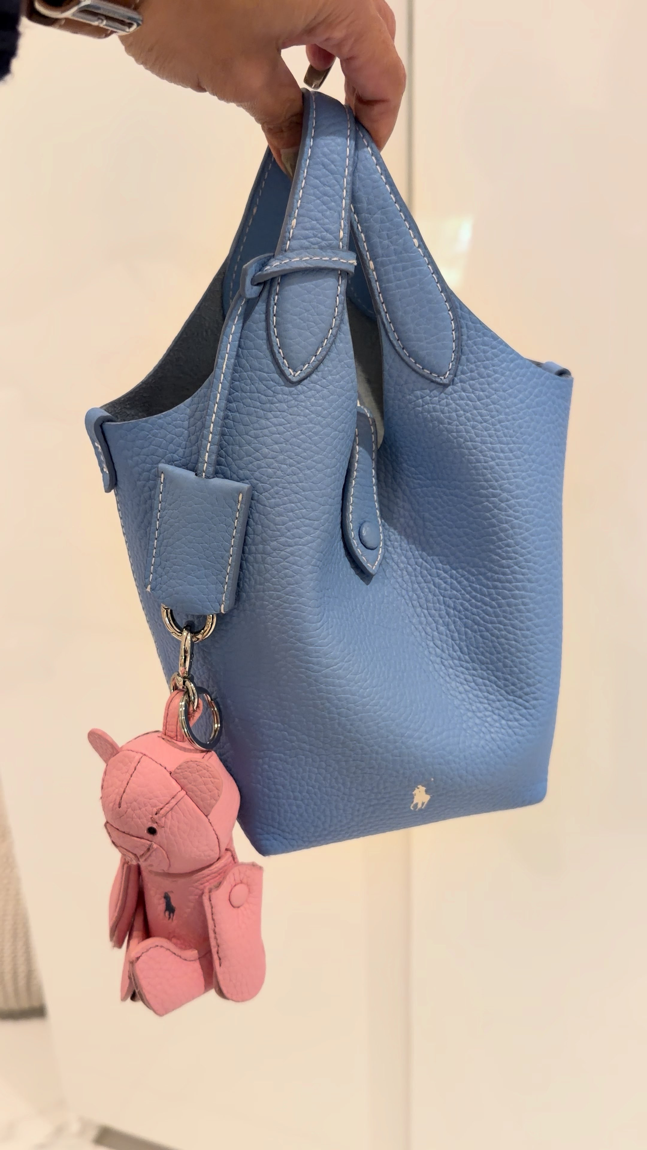 How cute are these bucket bags from Polo by Ralph Lauren. Adding a pop of color with these playful mini bags never look so chic. Available in Many Colors and also they come with removable strap for a crossbody option. 

 #LTKgrwm #LTKootd