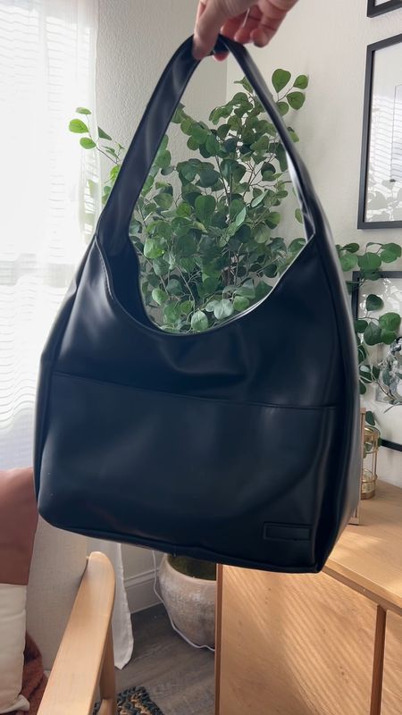 Finally caved and got the viral bag safe to say I like it. 

Amazon finds, tote bag, mom bag, black bag, work bag 

#LTKfindsunder50 #LTKitbag #LTKstyletip