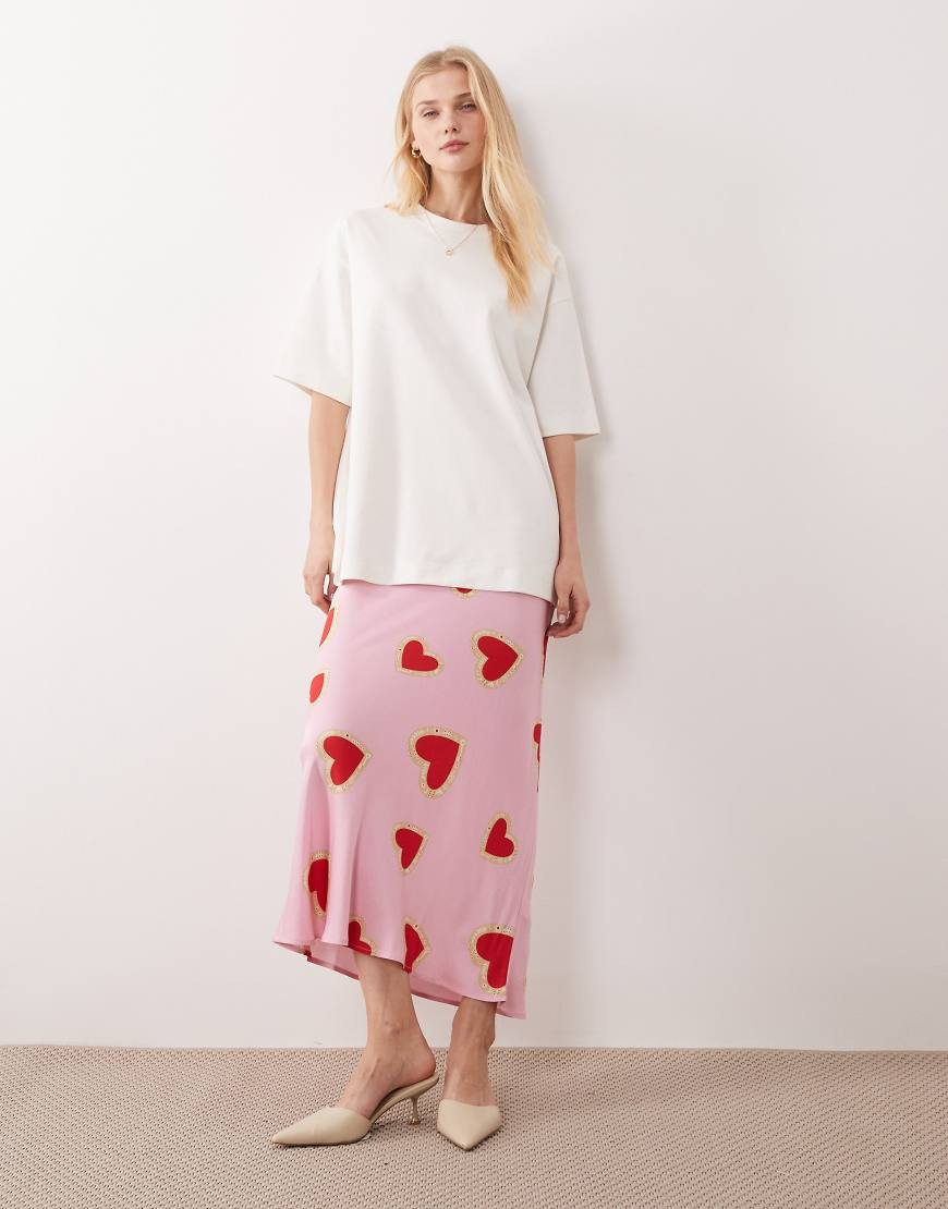 Never Fully Dressed Dorris satin maxi skirt in pink heart print | ASOS (Global)
