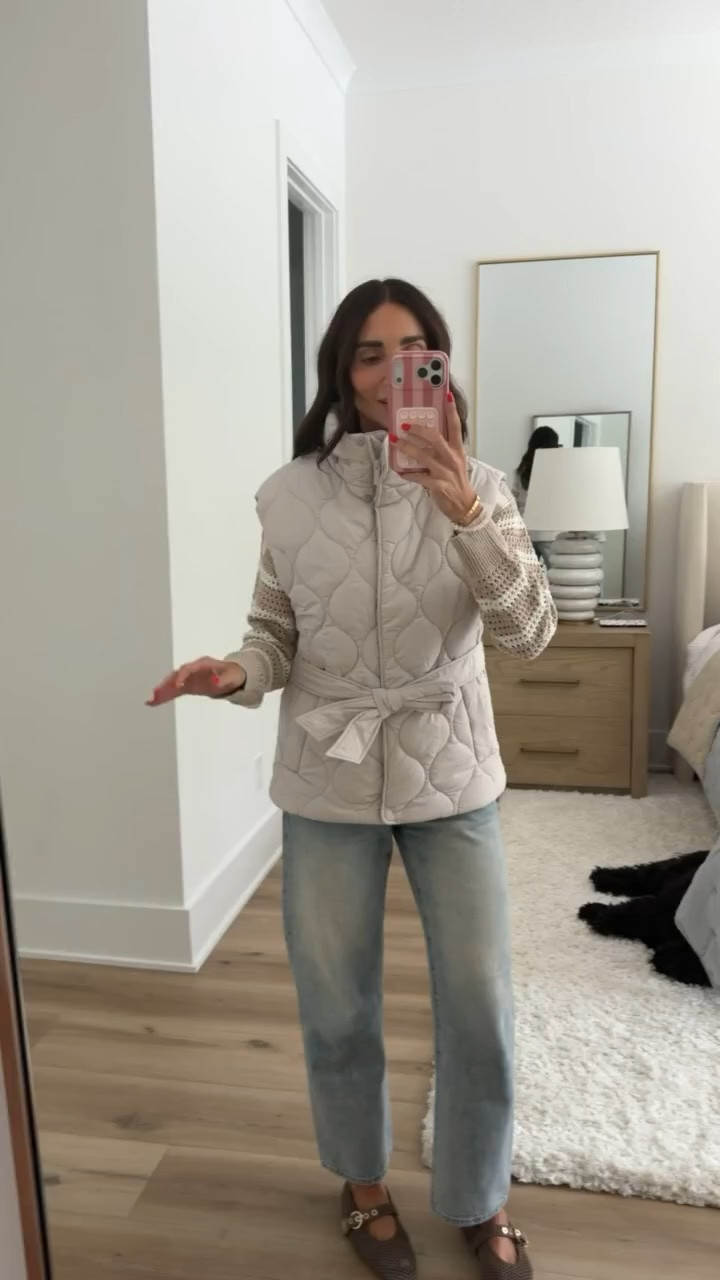This quilted vest is one of those layering pieces that instantly makes a simple outfit look more put together. I love the oversized quilting, adjustable tie waist, and high collar that keeps it feeling cozy without adding bulk. It will be so easy to throw over lightweight sweaters, long sleeves, or even a striped tee all fall.

quilted vest, tie waist vest, fall layering piece, neutral outerwear, lightweight puffer vest, casual fall outfit, cozy layers, everyday style, transitional fashion, fall wardrobe, annabrstyle

#LTKSeasonal #LTKOver40 #LTKootd