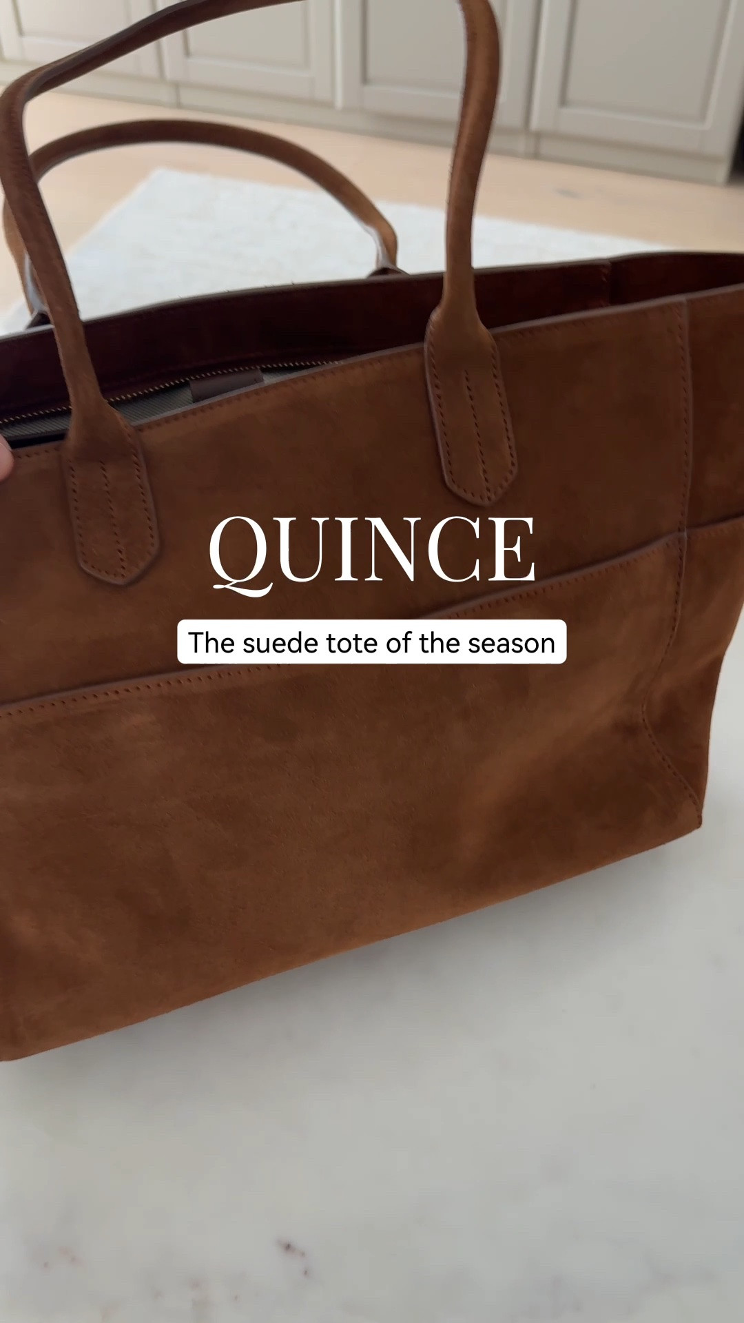This suede tote from @Quince is so beautiful. Love the whiskey color, perfect strap length, zipper, and interior and exterior pockets. Such a good everyday size, and it comes in a few colors. #quincepartner

#LTKPetite
