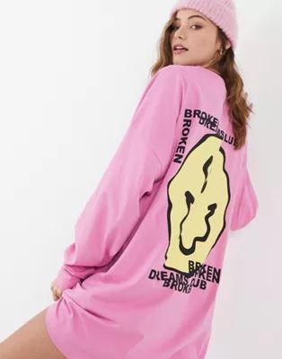 ASOS DESIGN oversized long sleeve t-shirt dress in pink with yellow face graphic | ASOS (Global)