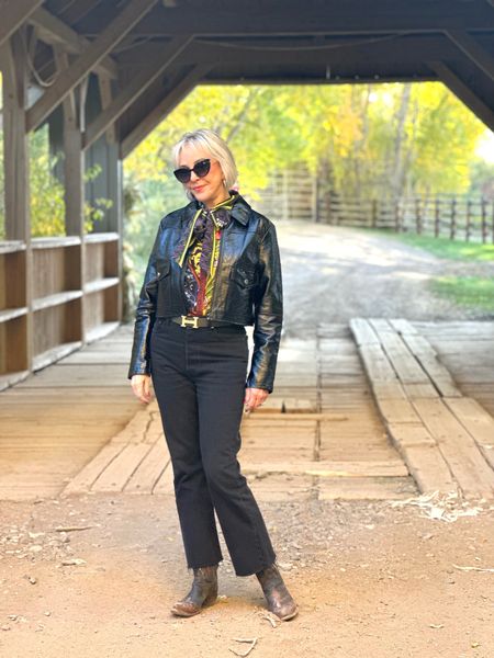 Taking it to the streets at the Covered Bridge Ranch. Levi  ripped jeans, black Patton crop jacket, Alice and Olivia print bow blouse and Lucchese cowboy boots. Kendra Scott gold hoops go with everything. 
#Streetstyle #westernstyle #versatilepieces #over50style #cowboyboots #pattinleatherjacket #aliceandolivia #luccheseboots #kendrascott #levis #blackdenim

#LTKstyletip #LTKSeasonal #LTKover40