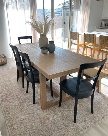 Dining room details. Natural wood dining table in seadrift, charcoal black dining chairs and bench. Counter height barstools. Amazon Viral curtains 

#LTKhome #LTKunder100 #LTKstyletip