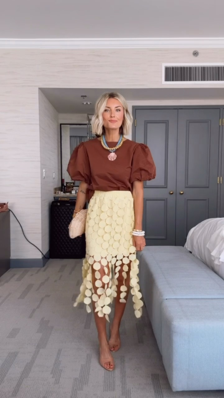 Loving the brown and butter yellow color combo in this look for an early fall moment! This skirt has such a high-end feel for a fraction of the price. Both pieces are size S!

Loverly Grey, Amazon fashion finds, butter yellow, brown outfit, designer lookalike skirt, Simon Miller inspired skirt, Beep Beep skirt inspired, affordable fashion finds for women, fall outfit inspo

#LTKSeasonal #LTKootd
